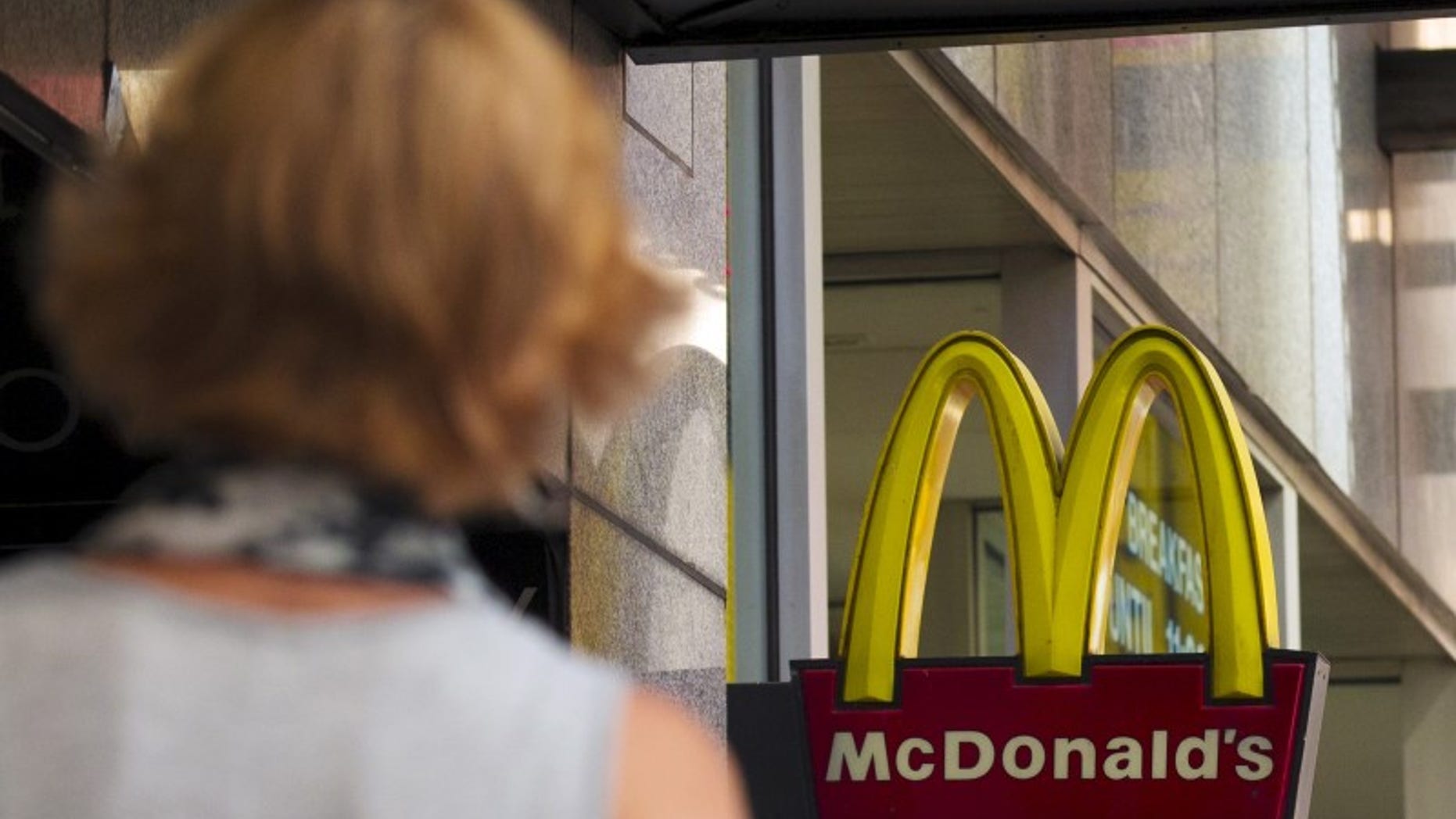 The sign for McDonald's in Times Square is seen in New York July 23, 2015. REUTERS/Brendan McDermid
