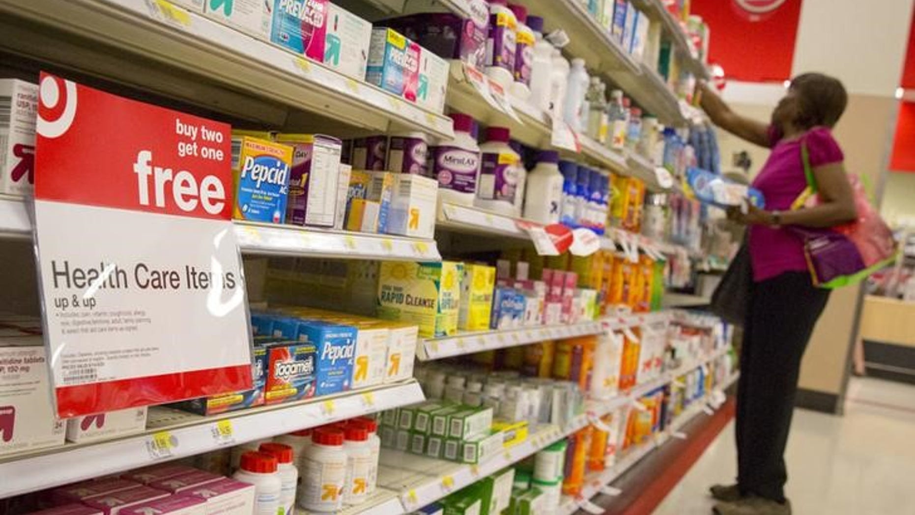 A customer shops in the pharmacy department of a Target store in the Brooklyn borough of New York June 15, 2015. REUTERS/Brendan McDermid