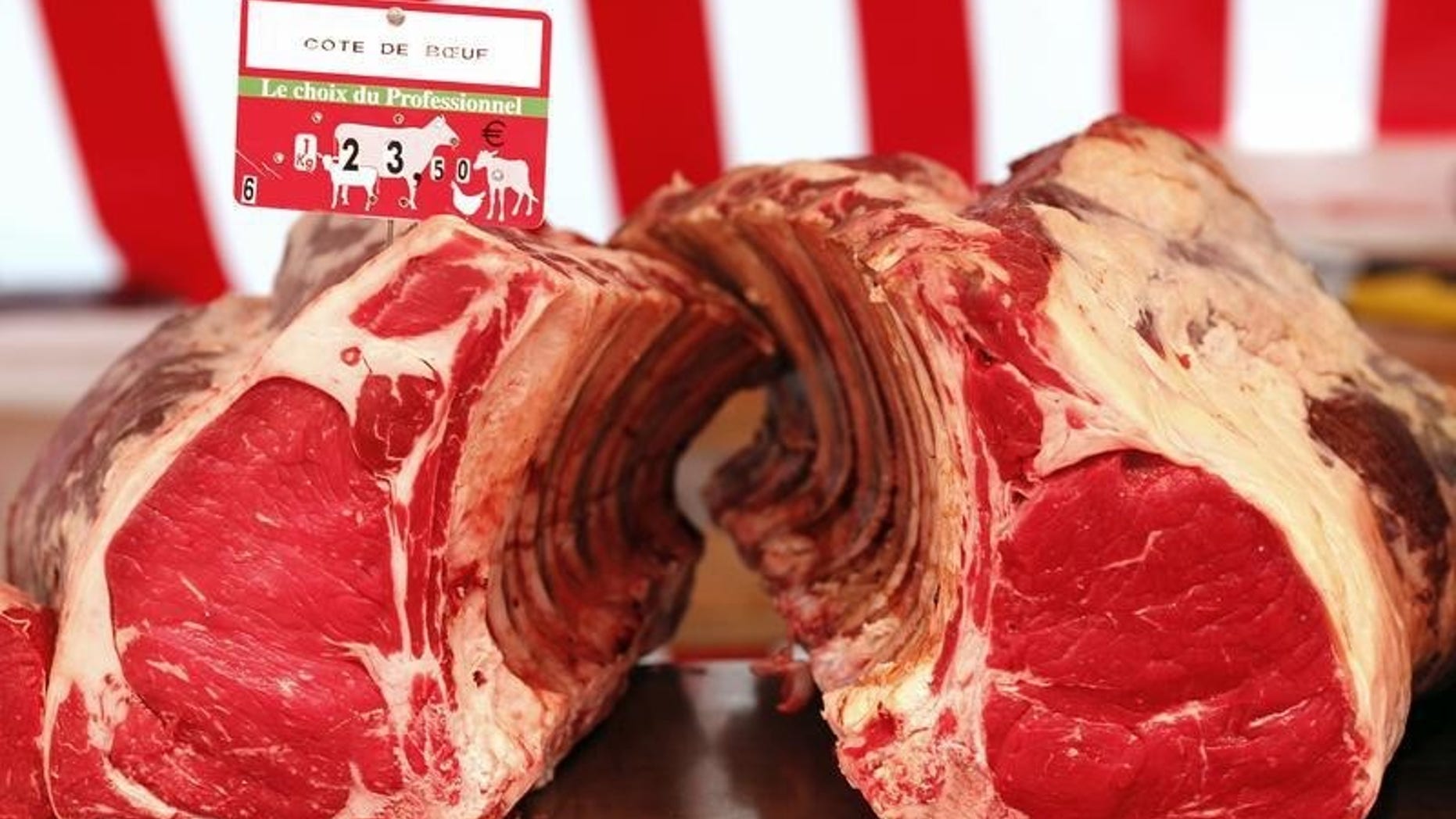 Meat is offered for sale at a street market in Paris March 11, 2012. REUTERS/Mal Langsdon