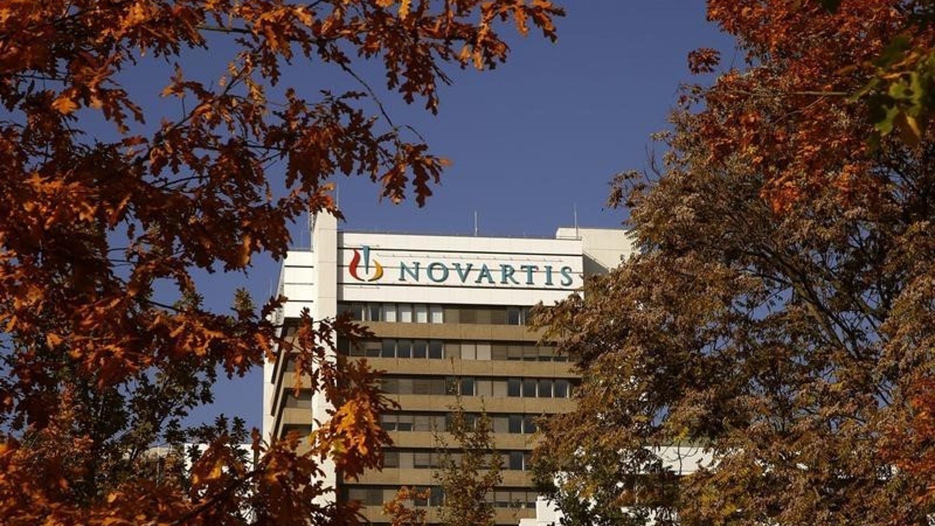 The logo of Swiss pharmaceutical company Novartis is seen on its headquarters building in Basel, Switzerland October 27, 2015. REUTERS/Arnd Wiegmann
