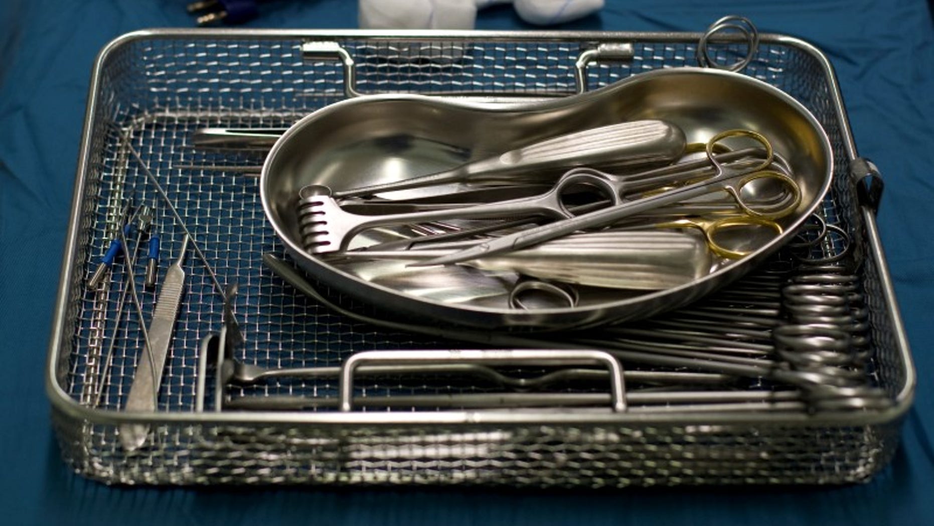 Surgery instruments are pictured during procedures to clean the wound of an amputee patient with MRSA (Methicillin resistant Staphylococcus Aureus) in the operating theatre at the Unfallkrankenhaus Berlin (UKB) hospital in Berlin February 29, 2008. REUTERS/Fabrizio Bensch