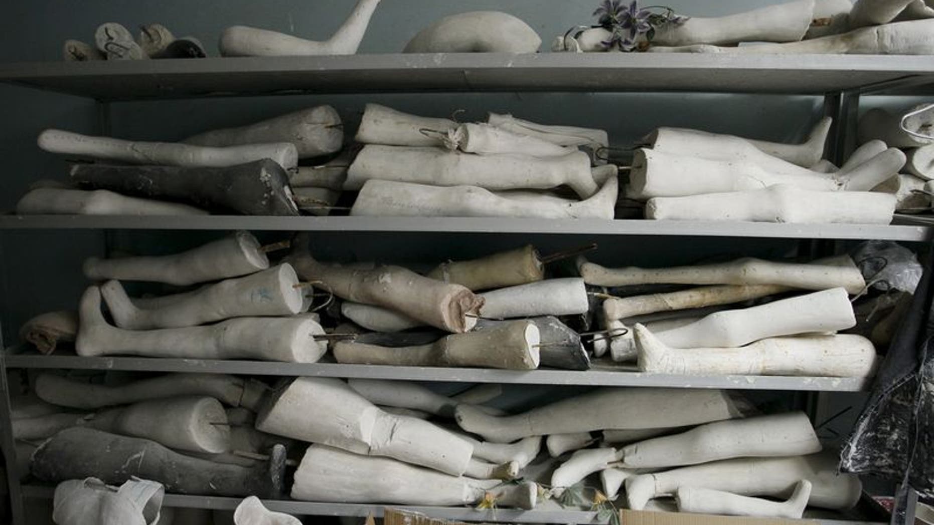 Plaster of Paris moulds of legs are stored at the Orthopedic Center in Donetsk, Ukraine, December 2, 2015. REUTERS/Alexander Ermochenko