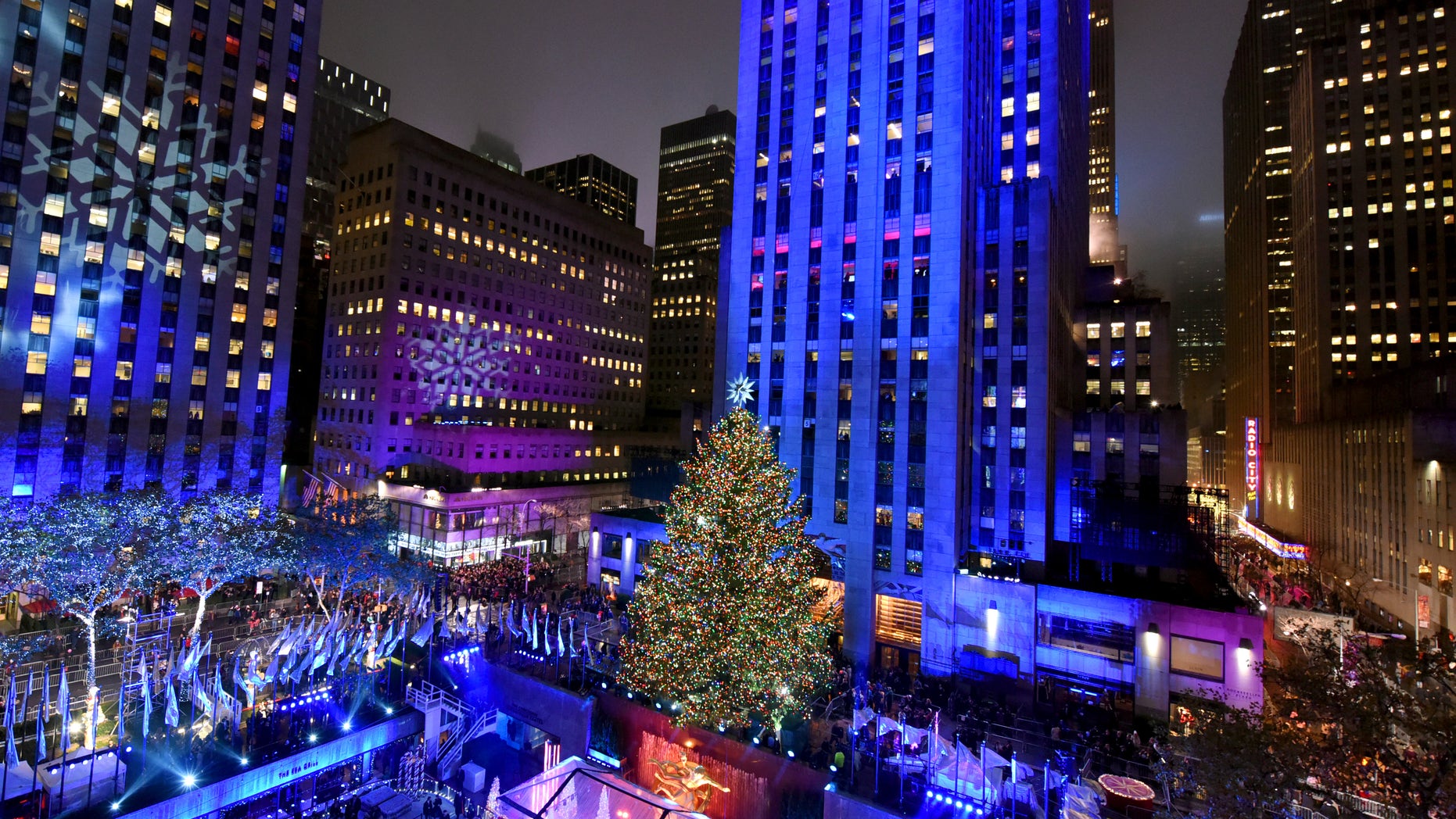 The Rockefeller Center Christmas Tree is lit at the 83rd Annual Rockefeller Center Christmas Tree Lighting Ceremony, Wednesday, Dec. 2, 2015 in New York. AP