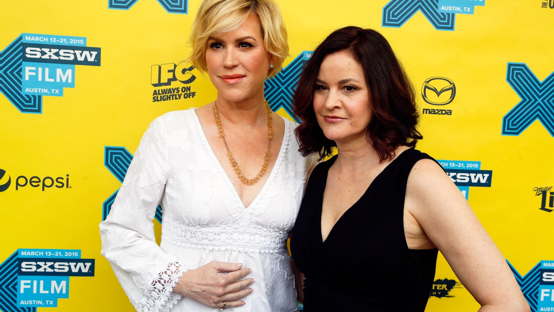 Molly Ringwald, left, and Ally Sheedy walk the red carpet for "The Breakfast Club" 30th Anniversary Restoration World Premiere during the South by Southwest Film Festival on Monday, March 16, 2015 in Austin, Texas. (Photo by Jack Plunkett/Invision/AP)