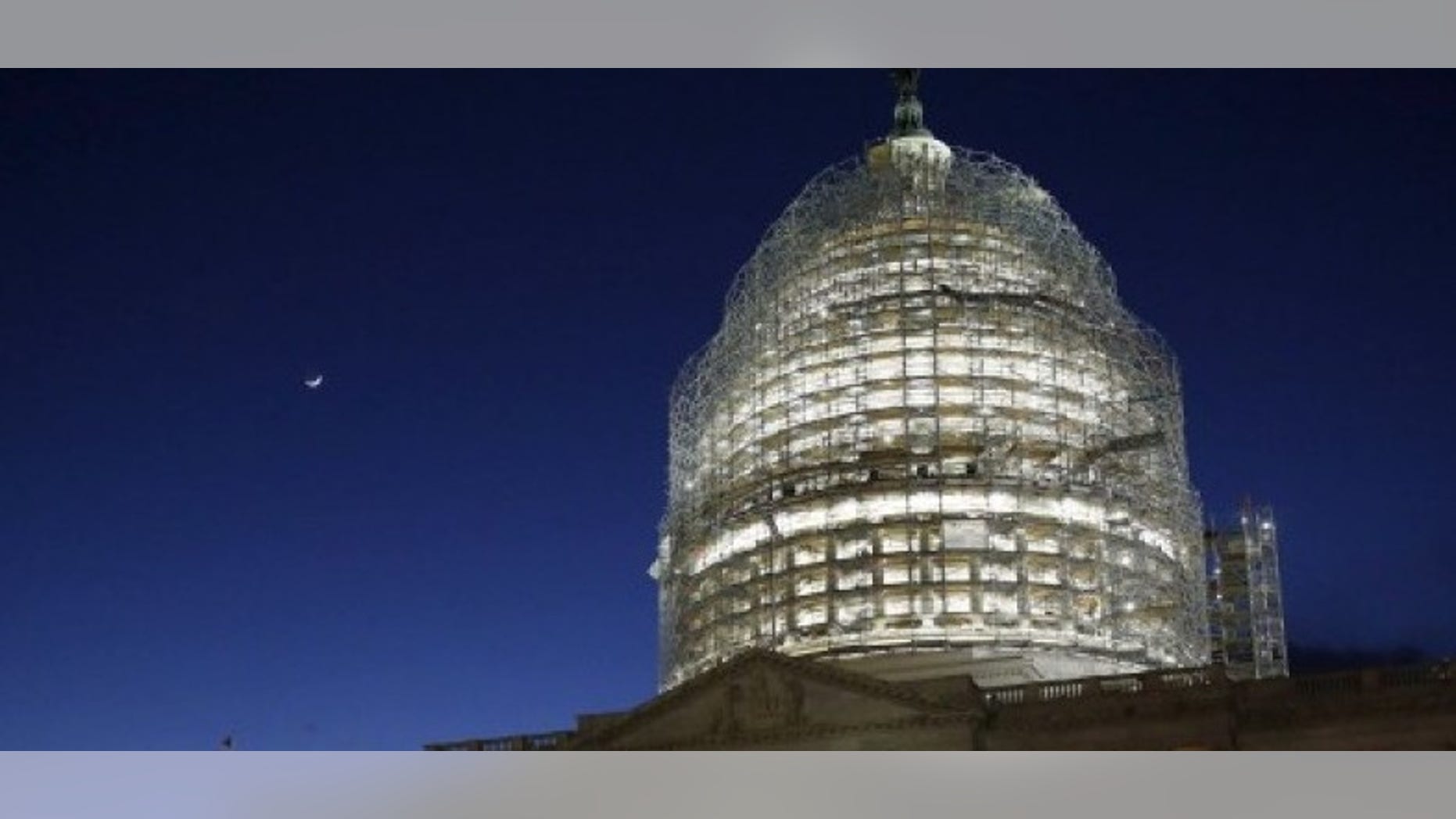 The sun sets behind the U.S. Capitol dome in the hours before President Barack Obama delivers the State of the Union address to a joint session of Congress in Washington January 12, 2016. REUTERS/Jonathan Ernst