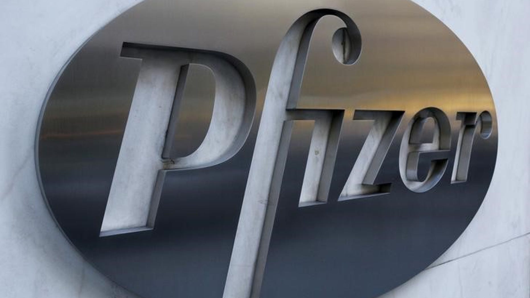 The Pfizer logo is pictured on the company's World Headquarters building in the Manhattan borough of New York November 23, 2015. REUTERS/Brendan McDermid