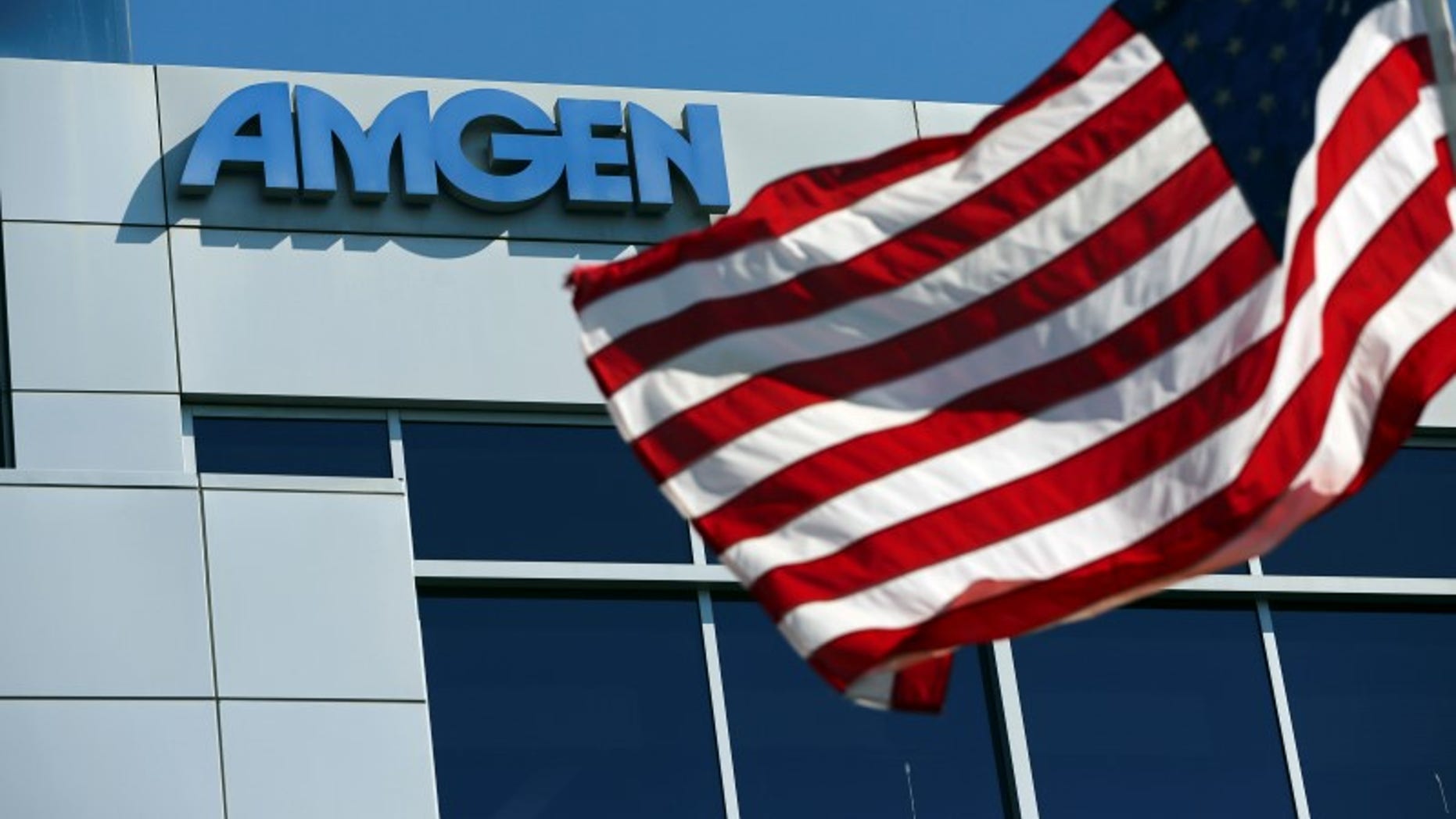 An Amgen sign is seen at the company's office in South San Francisco, California October 21, 2013. REUTERS/Robert Galbraith (UNITED STATES