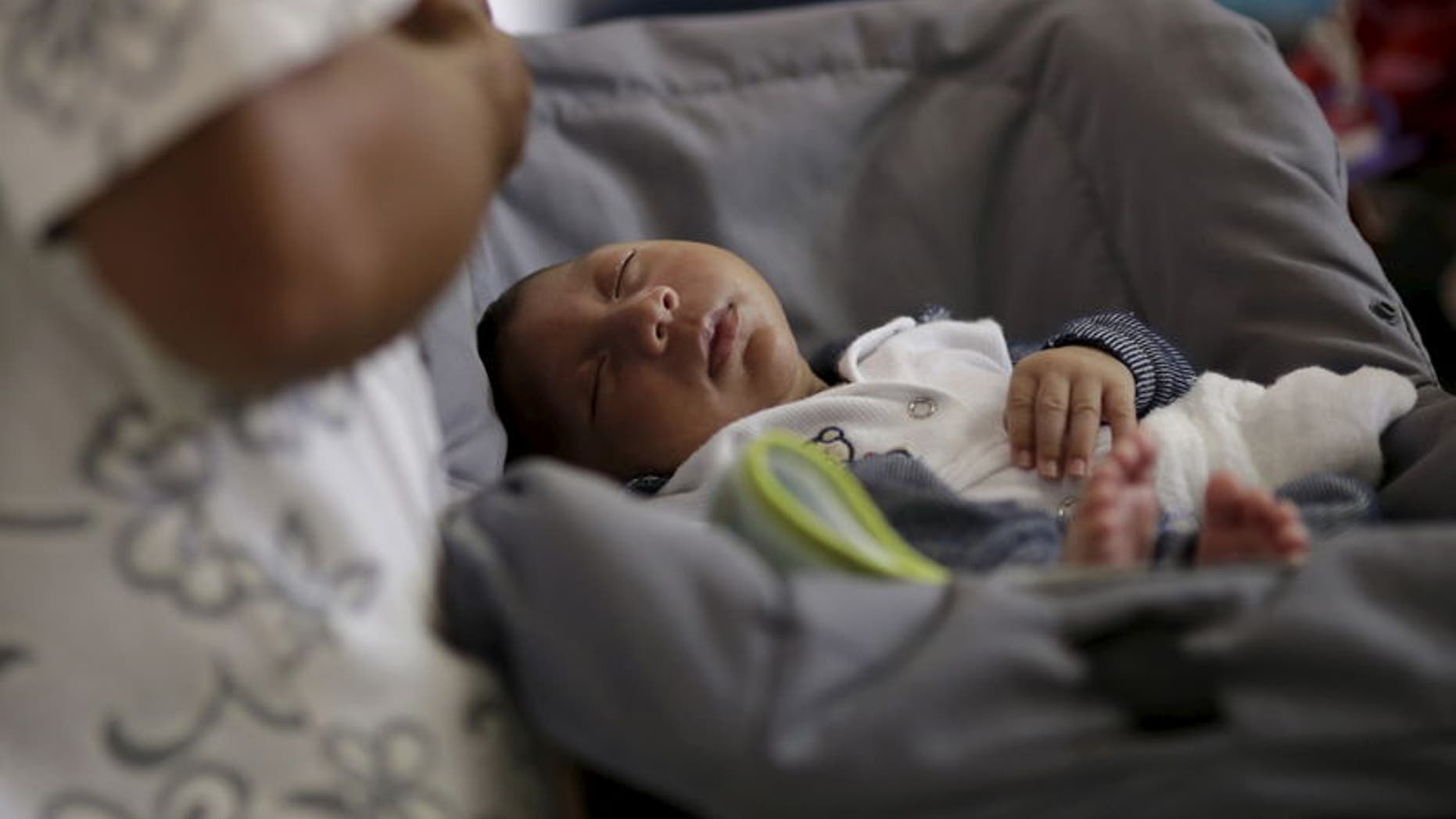 Gustavo Henrique, who has microcephaly, son of Jaqueline Maria and Geovane Silva, undergoes medical treatment at the Oswaldo Cruz Hospital in Recife, Brazil, January 26, 2016. REUTERS/Ueslei Marcelino