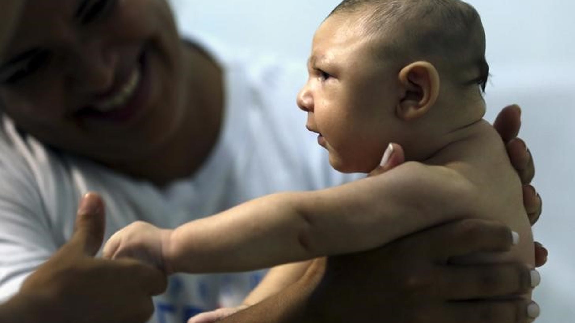 The Wider Image: Alternative therapies for microcephaly