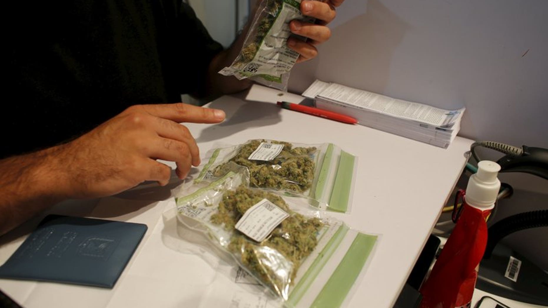 Packages of medical marijuana are seen on a counter at a dispensary belonging to Tikun Olam, Israel's largest medical marijuana supplier, in Tel Aviv