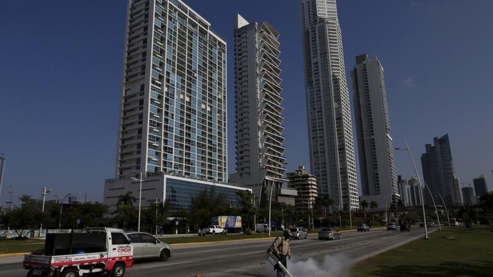 A health worker carries out fumigation as part of preventive measures against the Zika virus and other mosquito-borne diseases in Panama City