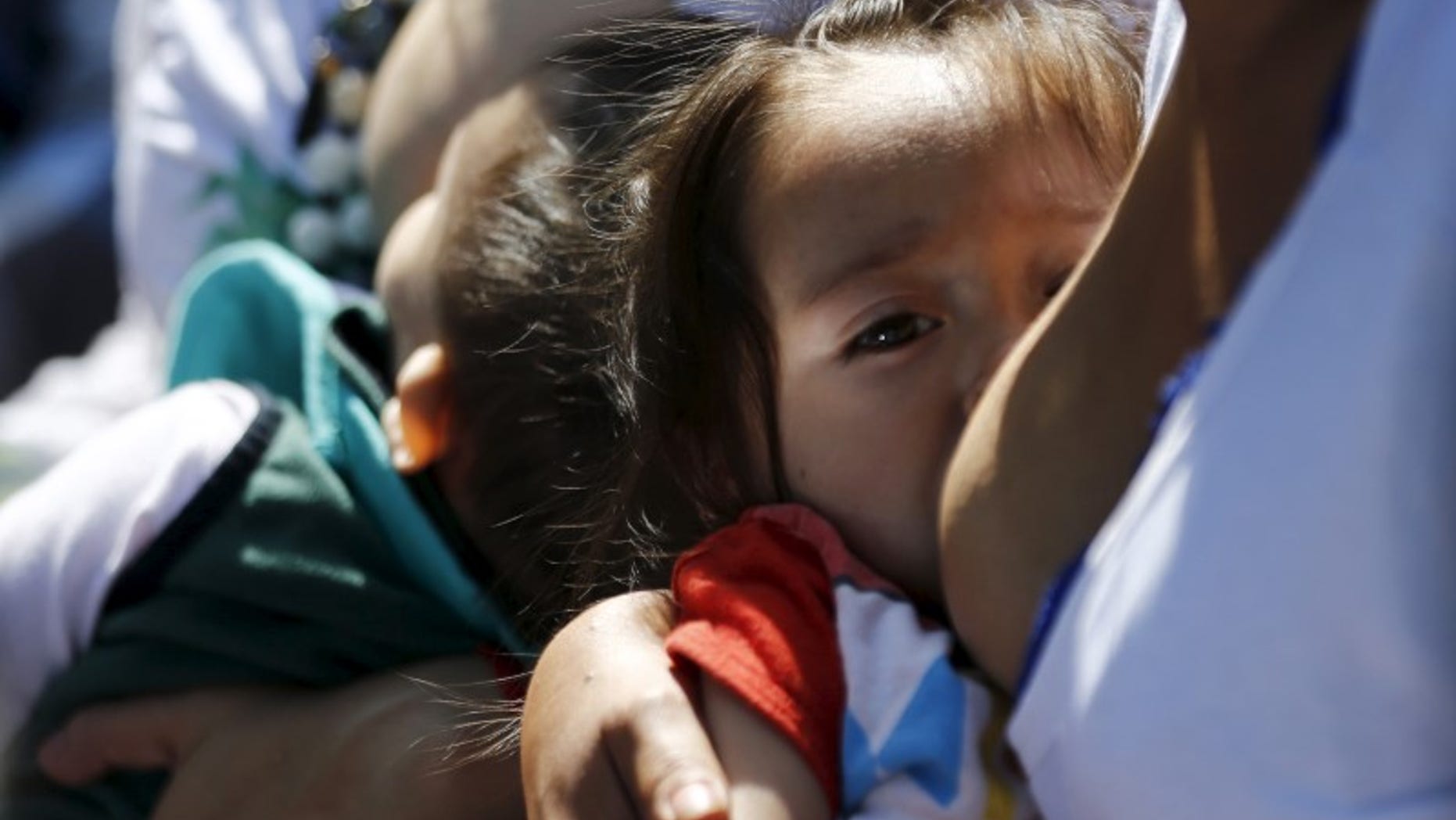 Women breastfeed babies during an event, at Chapultepec Park in Mexico City