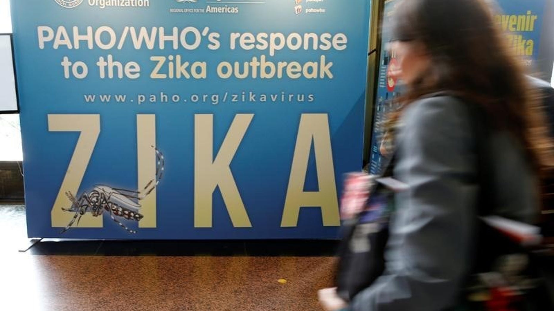 Material to prevent Zika infection by mosquitoes are displayed at the 68th World Health Assembly at the UN in Geneva