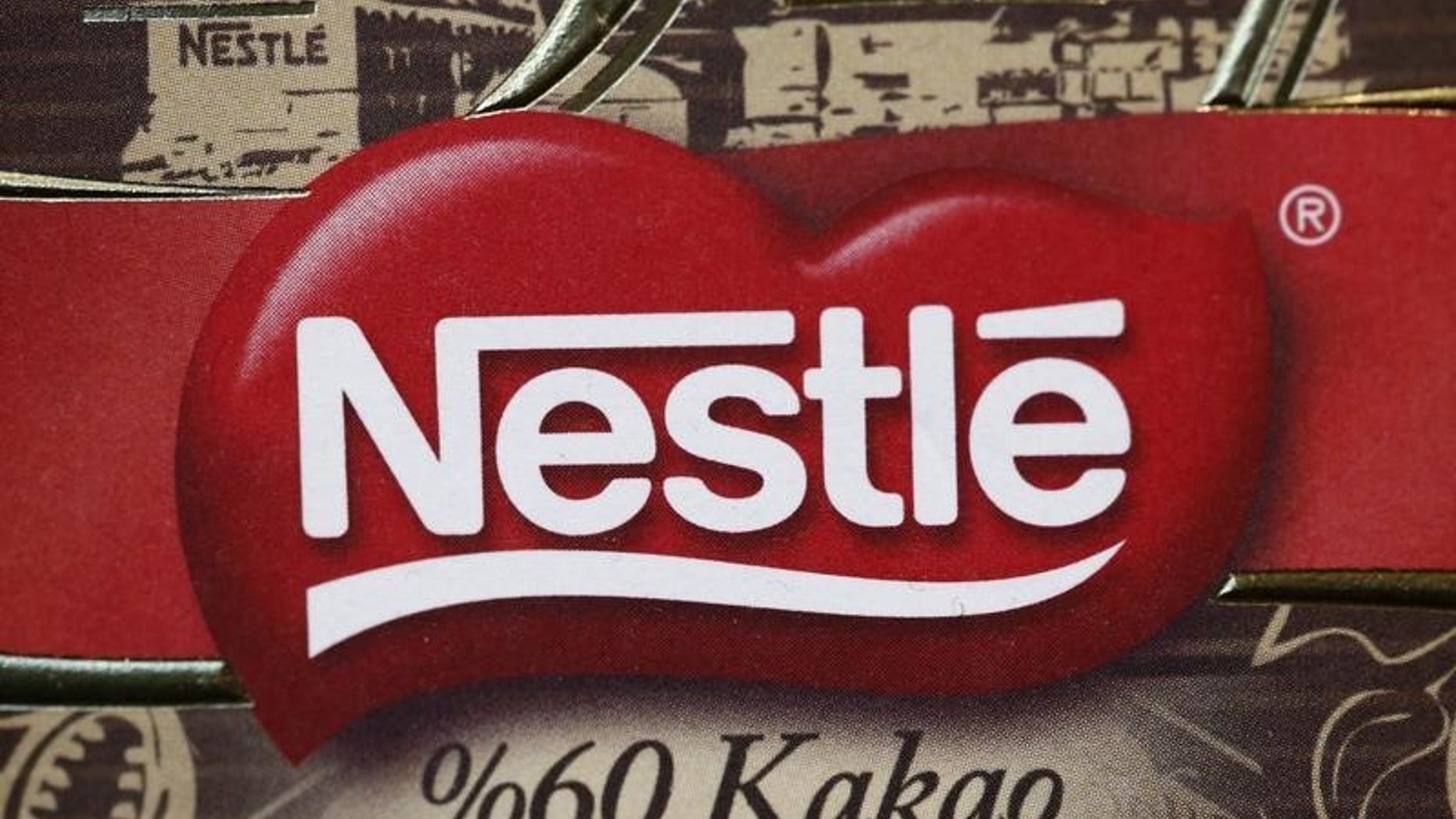 A Nestle logo is pictured on sample products on display at the company headquarters in Vevey