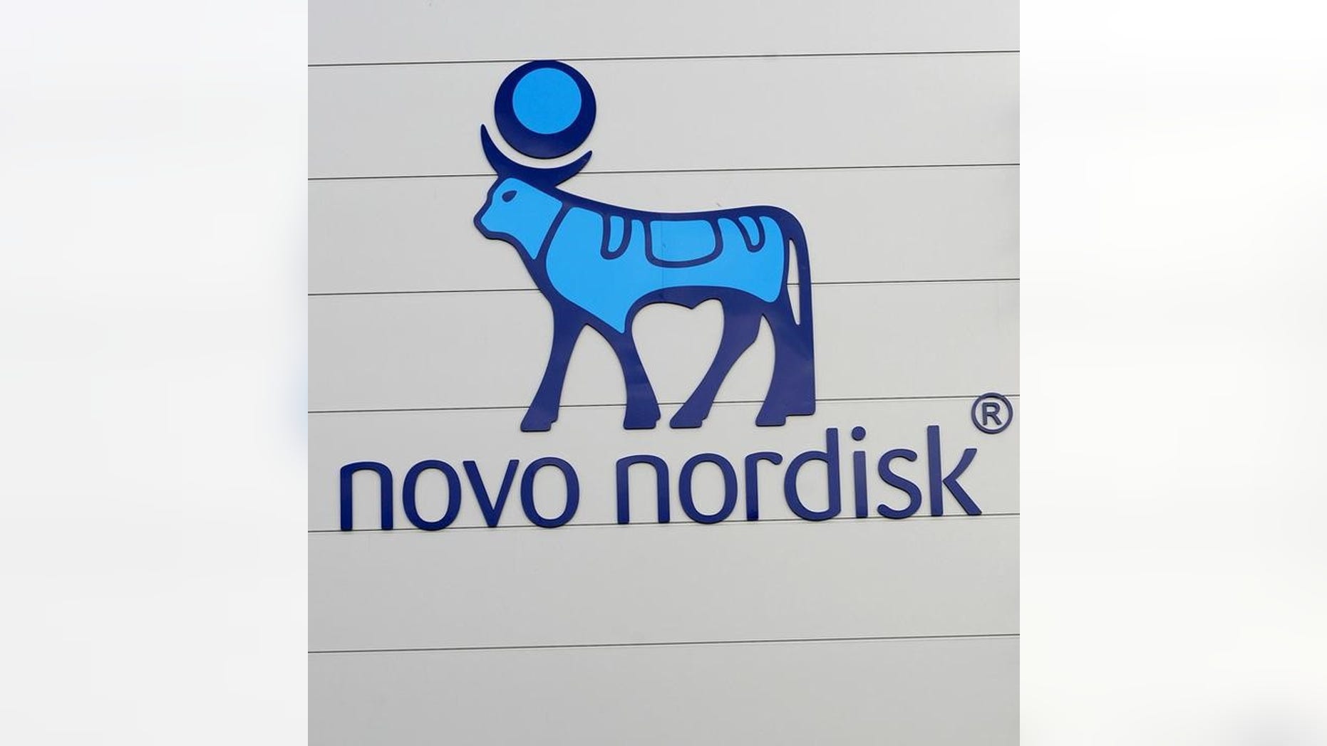 The logo of Danish multinational pharmaceutical company Novo Nordisk is pictured on the facade of a production plant in Chartres