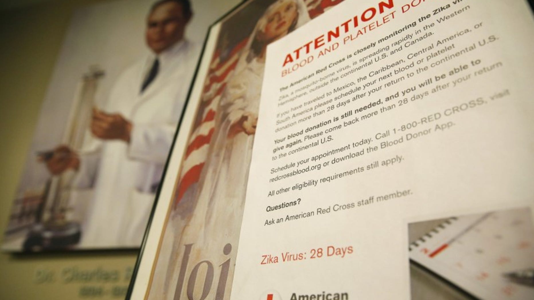 Sign explaining the parameters concerning the Zika virus and blood donations is seen at the American Red Cross Charles Drew Donation Center in Washington