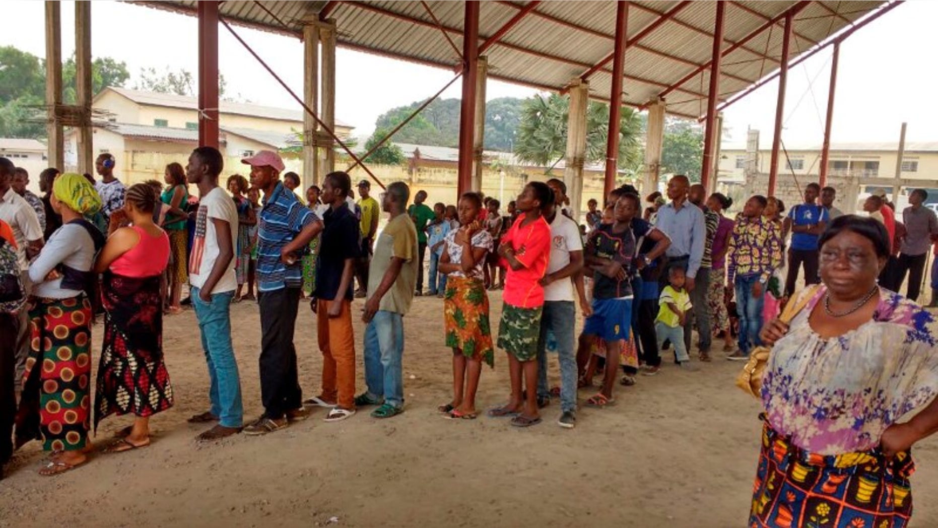 Congolese people queue to receive vaccination against yellow fever in Gombe district, of the Democratic Republic of Congo's capital Kinshasa.