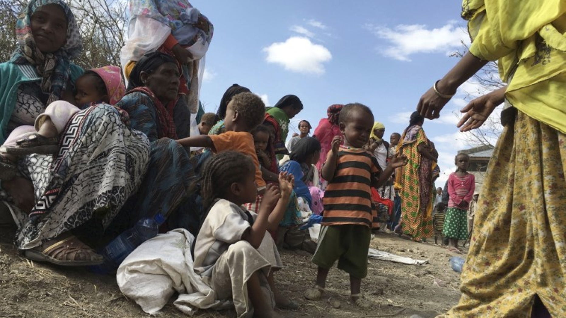 Malnourished children wait for medical attention at the Halo health post in Halo village, a drought-stricken area in Oromia region in Ethiopia