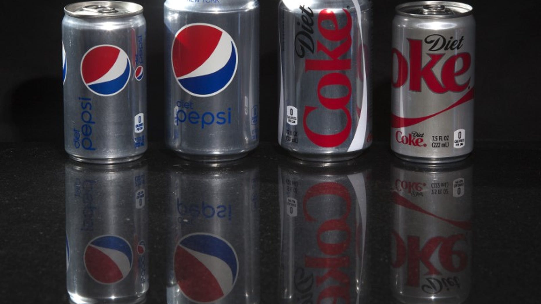Regular and mini cans of Diet Coke and Diet Pepsi are pictured in this photo illustration in New York