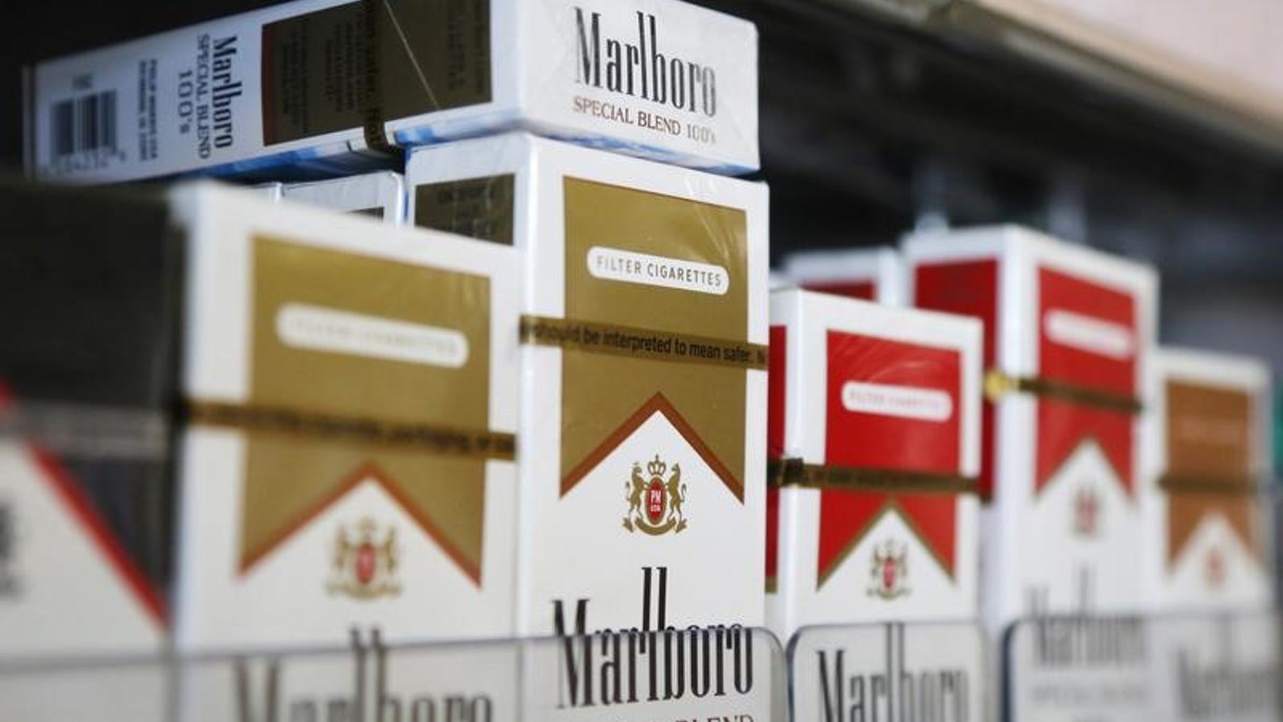 Packs of Marlboro cigarettes are displayed for sale at a convenience store in Somerville