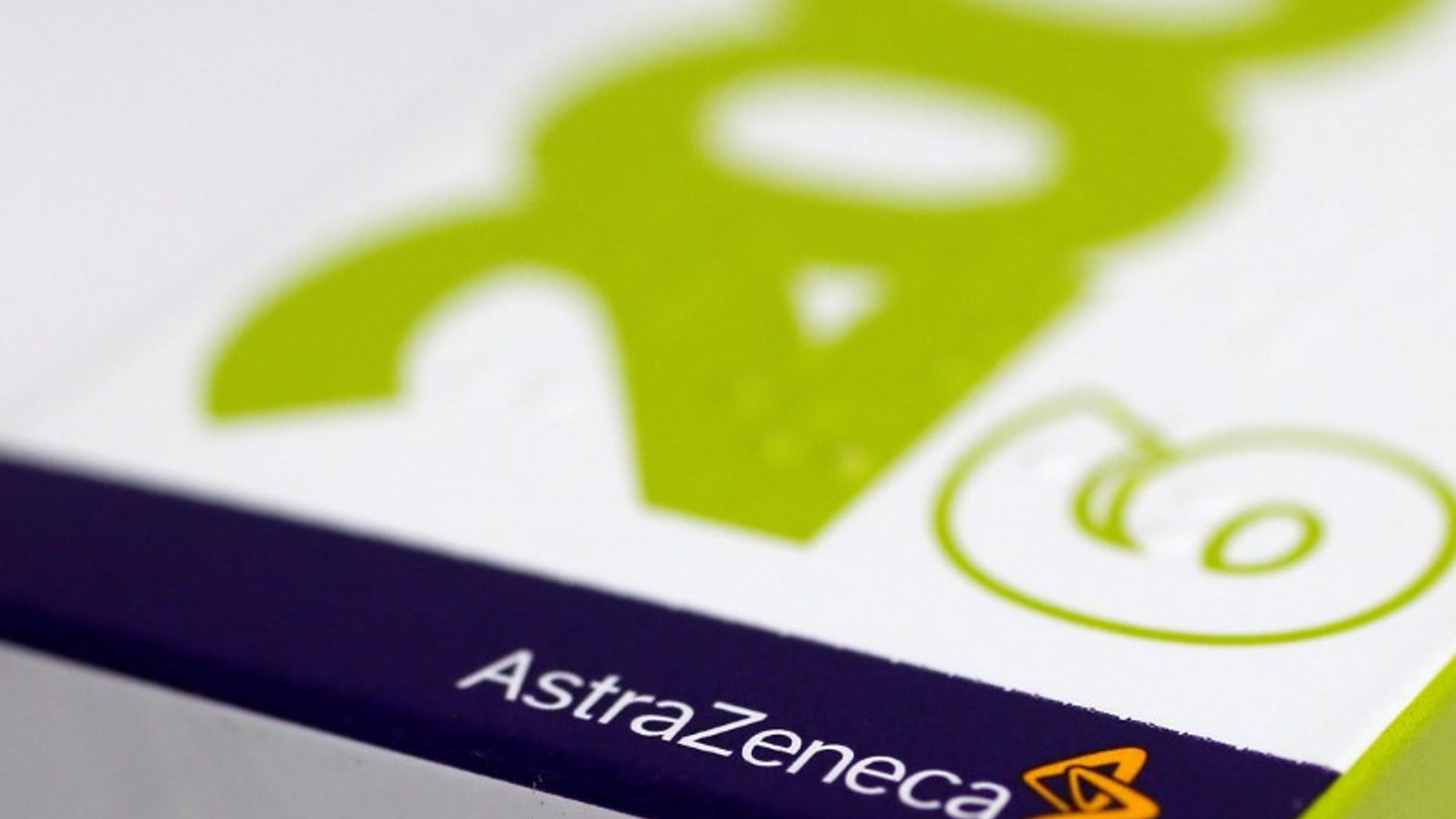 FILE PHOTO: The logo of AstraZeneca is seen on a medication package at a pharmacy in London