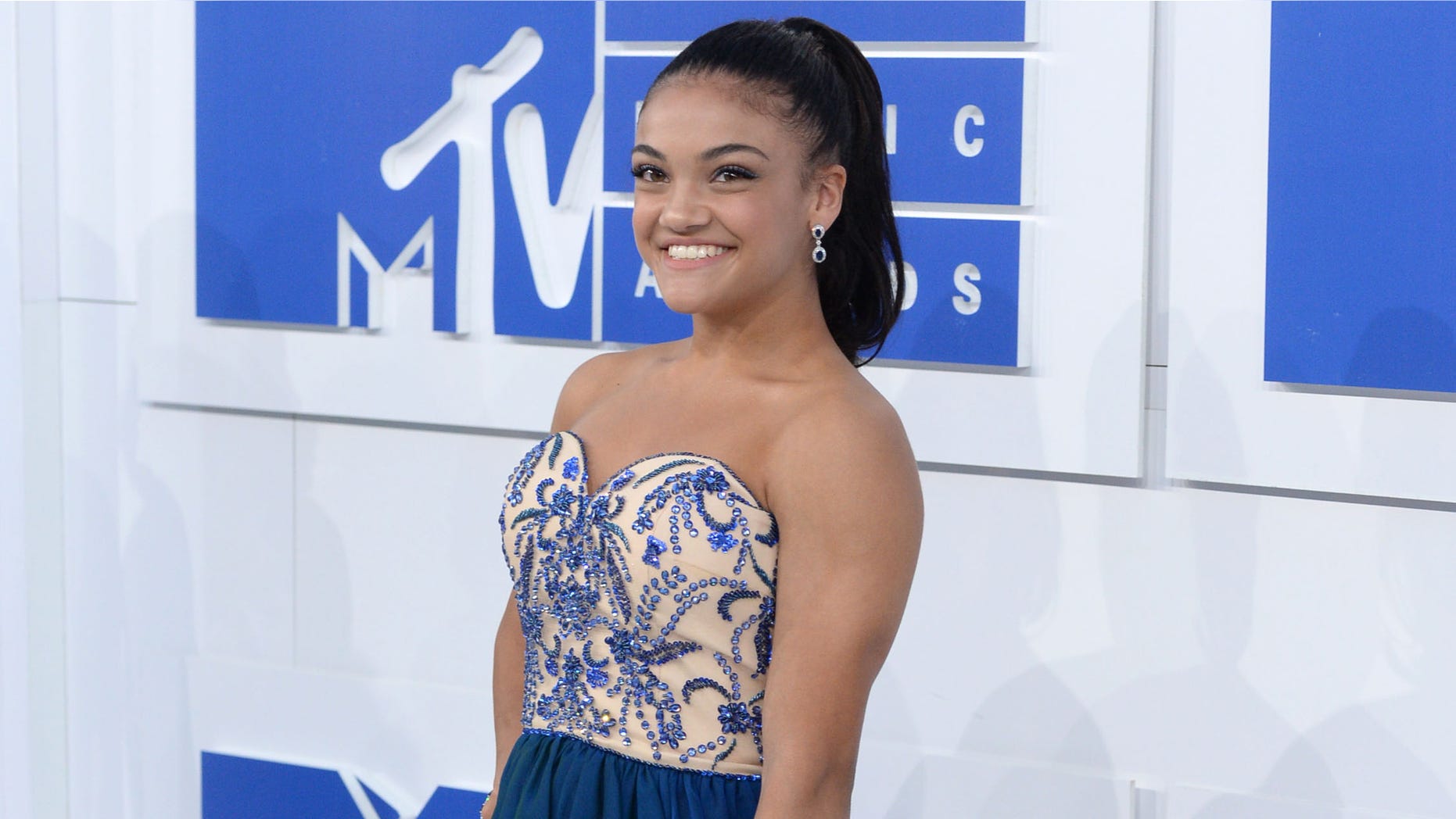 U.S. Olympic gymnast Laurie Hernandez arrives at the MTV Video Music Awards at Madison Square Garden on Sunday, Aug. 28, 2016, in New York. (Photo by Evan Agostini/Invision/AP)