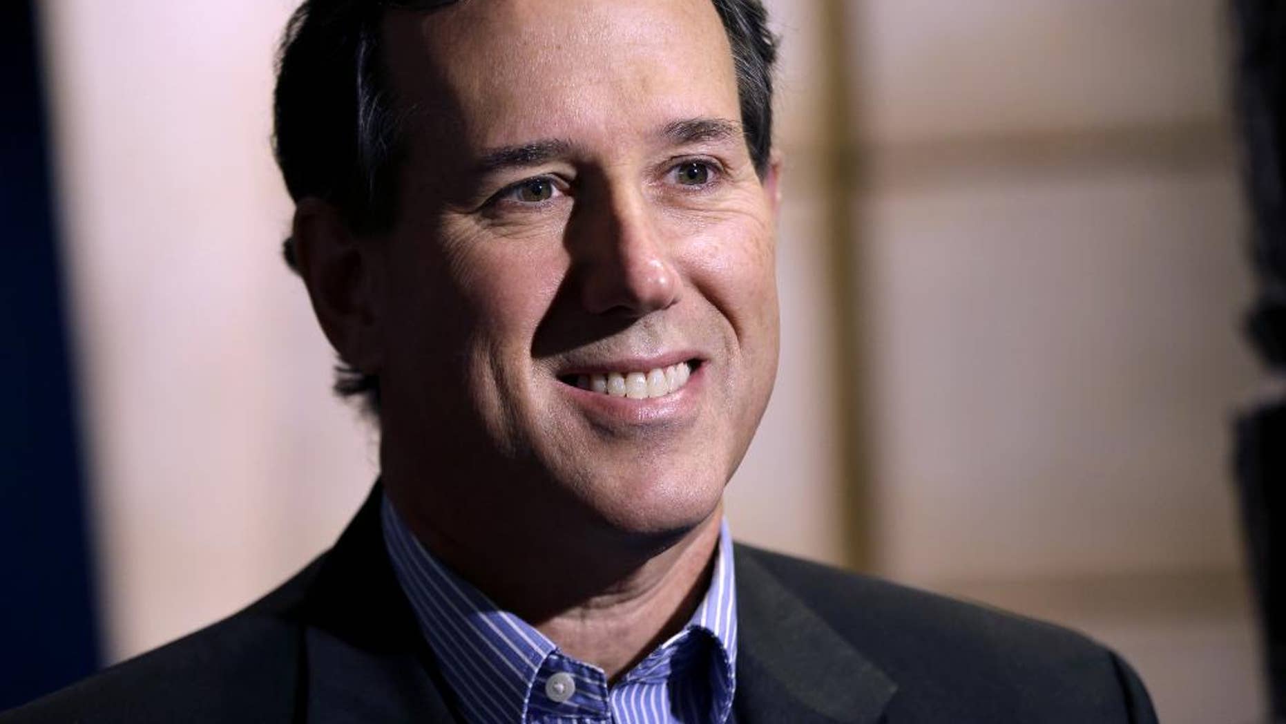 FILE - In this Nov. 18, 2013, file photo, former Pennsylvania Sen. Rick Santorum is seen in New York. Getting ready to run for president means working through a hefty checklist of activities long before most people are paying attention to the contest ahead. Prep work, positioning and auditioning don't wait for the primary season. Just about everyone thinking about running for president is kicking it into gear now, slowpokes included. (AP Photo/Seth Wenig, File)