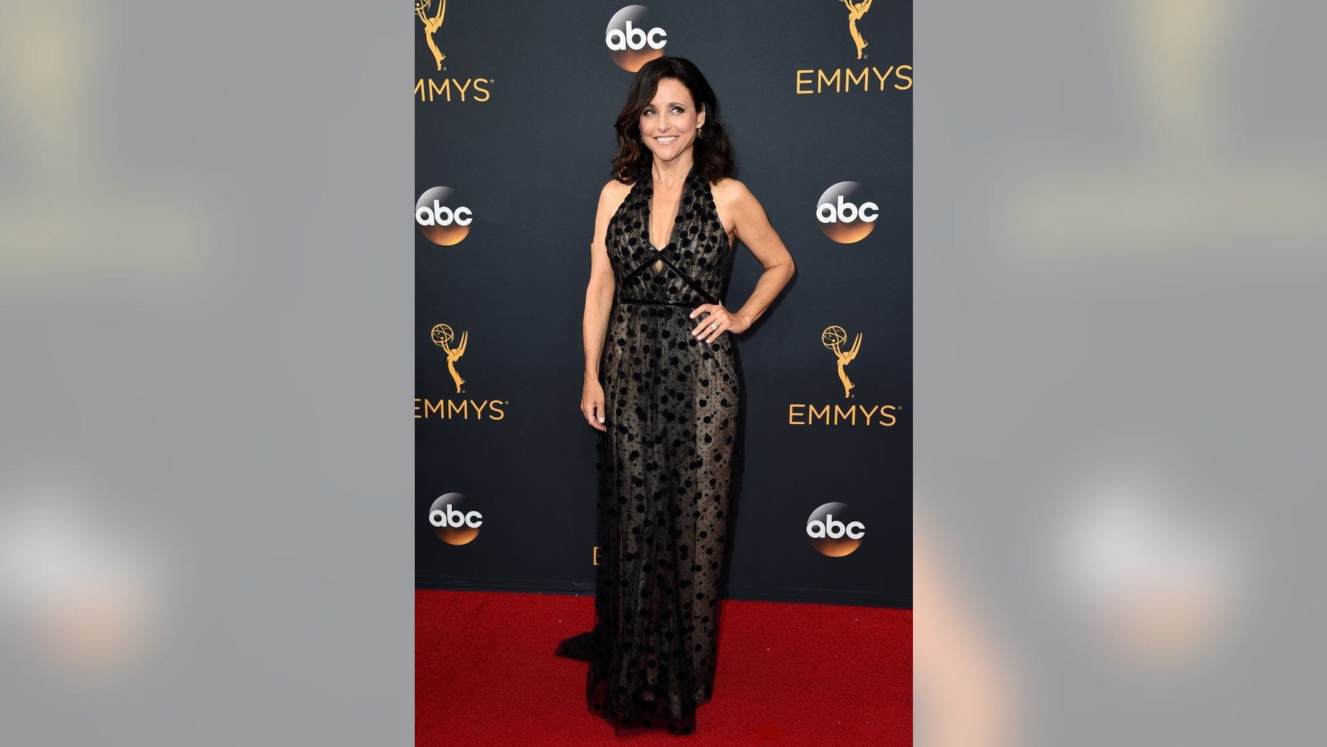 Julia Louis-Dreyfus arrives at the 68th Primetime Emmy Awards on Sunday, Sept. 18, 2016, at the Microsoft Theater in Los Angeles. (Photo by Jordan Strauss/Invision/AP)