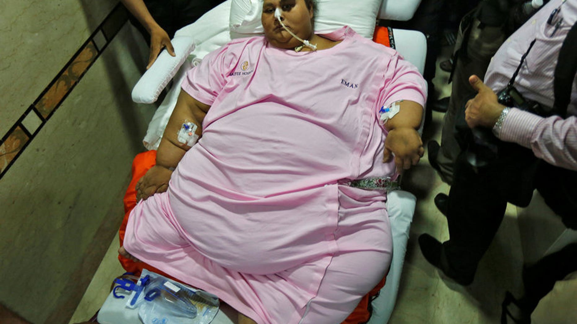 Eman Ahmed, an Egyptian woman who underwent weight loss surgery, is carried on a stretcher as she leaves a hospital in Mumbai