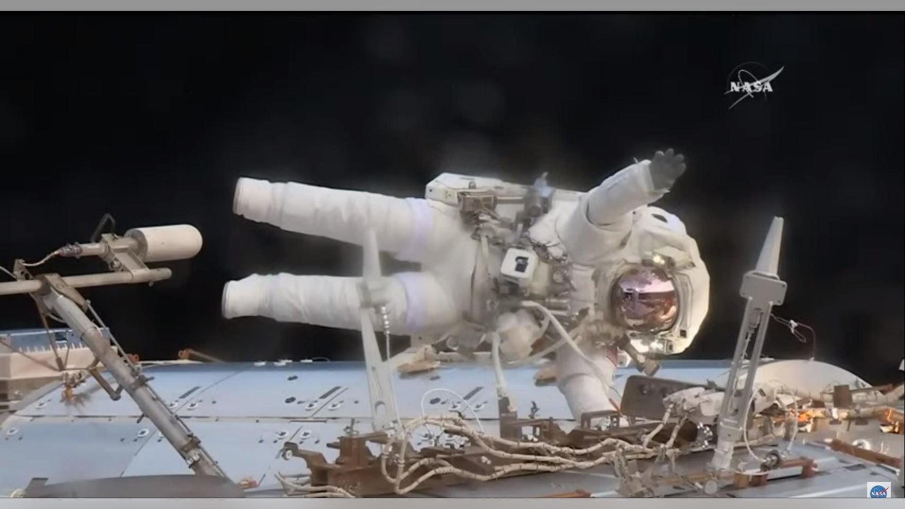 During a spacewalk May 23, NASA astronaut Jack Fischer waved at French astronaut Thomas Pesquet, filming from inside the International Space Station, as Fischer worked to install wireless antennas outside the Destiny lab. The spacewalk's main purpose was to replace a failed data relay box.