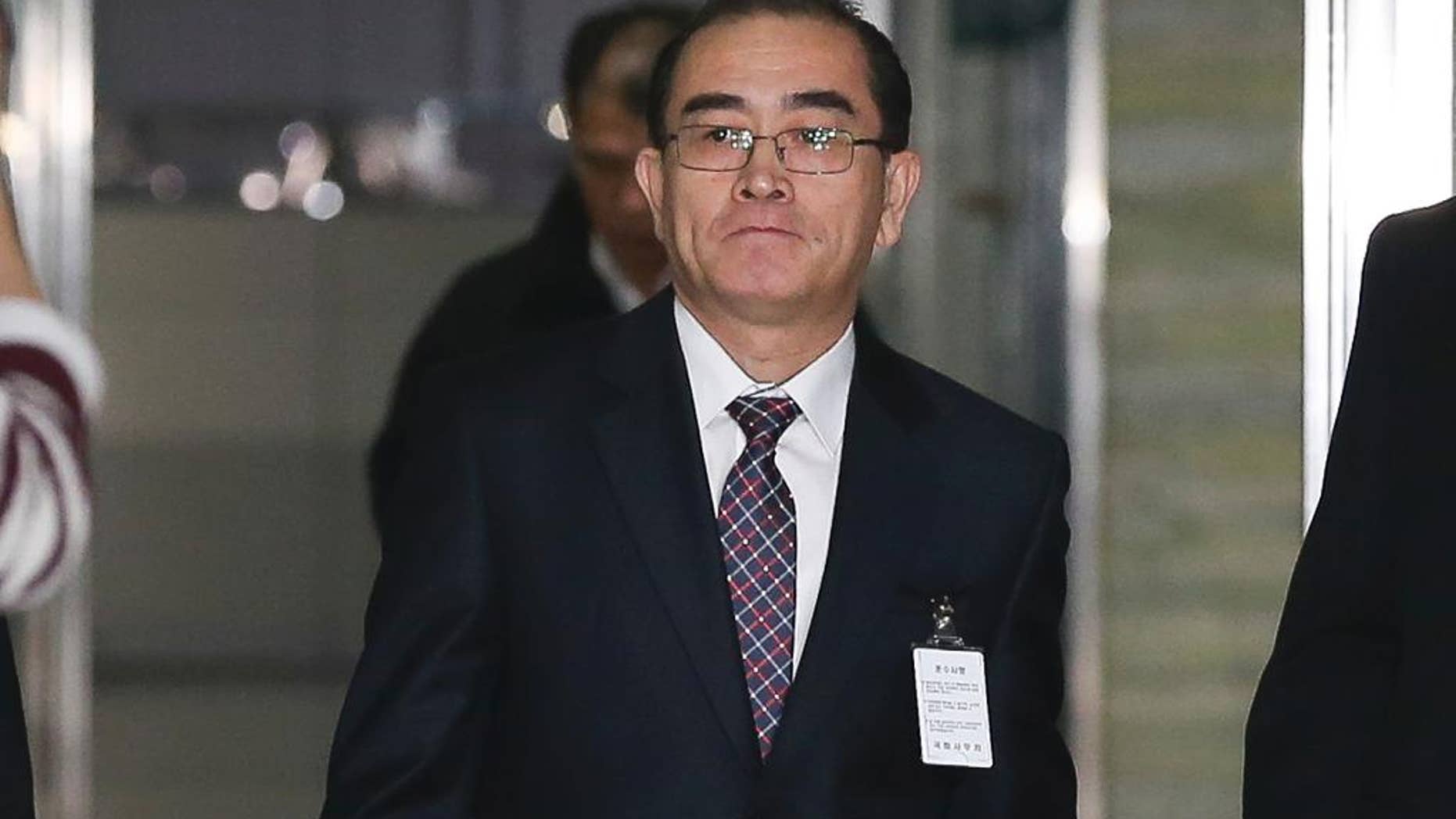 A high-profile North Korean defector Thae Yong Ho, No. 2 at the North's embassy in London, arrives for the National Assembly's intelligence committee in Seoul, South Korea, Friday, Dec. 23, 2016. A high-profile North Korean defector told South Korean lawmakers on Monday that he fled because of disillusionment with what he describes as a "tyrannical reign of terror" by leader Kim Jong Un, according to one of the lawmakers who attended their private meeting. (Kim Hyun-tae/Yonhap via AP)
