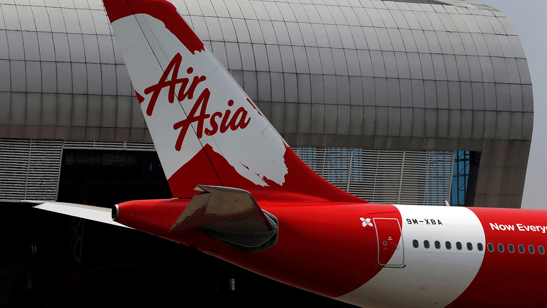 The Malaysia-based airline was accused of deliberately trying to override a passenger clearance system.