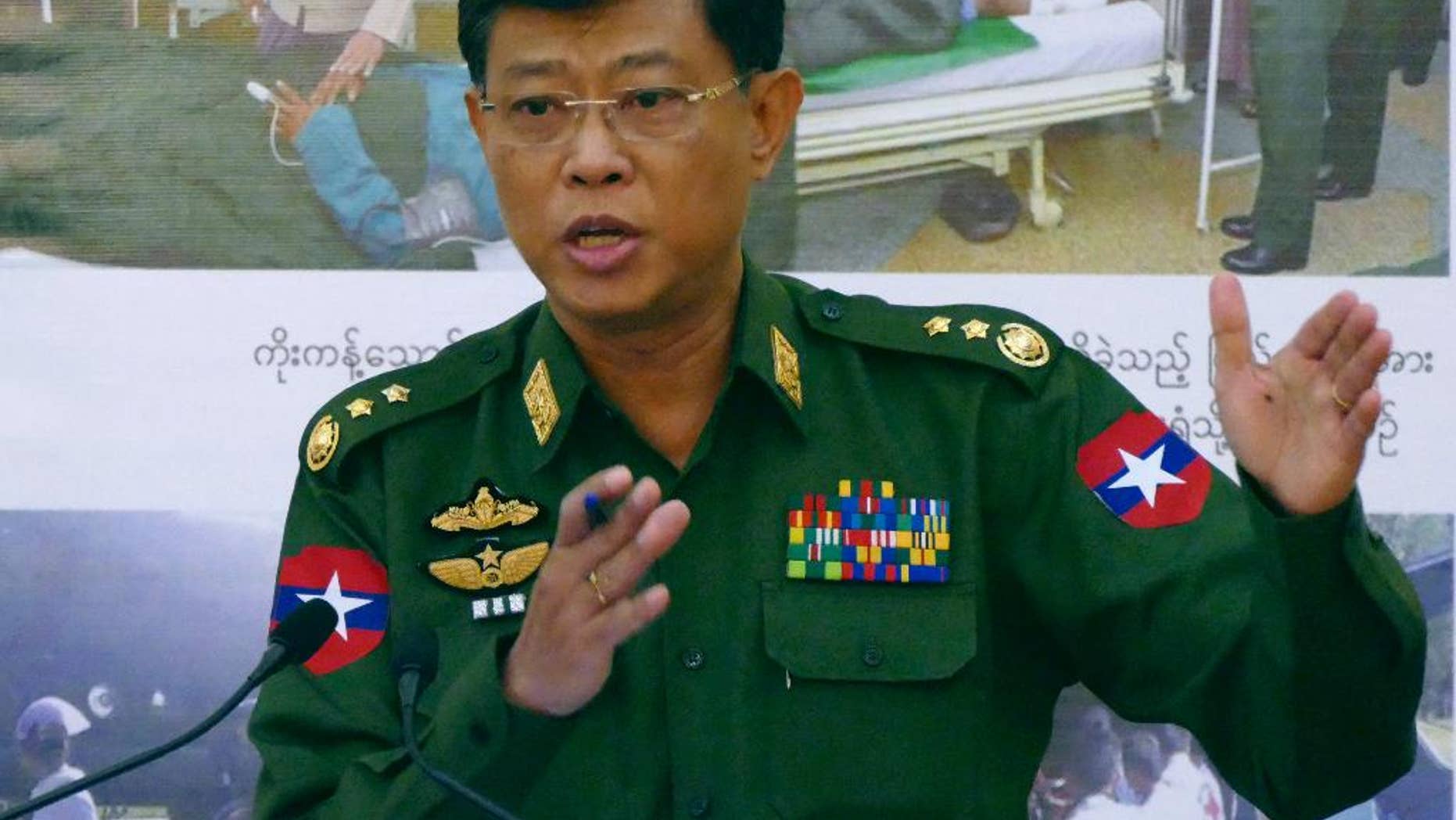 Myanmar's Chief of Military Affairs Security, Lt. Gen. Mya Tun Oo, talks to journalists during a press conference at the Defense Ministry Saturday, Feb. 21, 2015, in Naypyitaw, Myanmar. Myanmar is claiming that allied minority rebel groups and former Chinese soldiers recruited as mercenaries are supporting ethnic Kokang rebels in fighting against government troops. (AP Photo/Khin Maung Win)