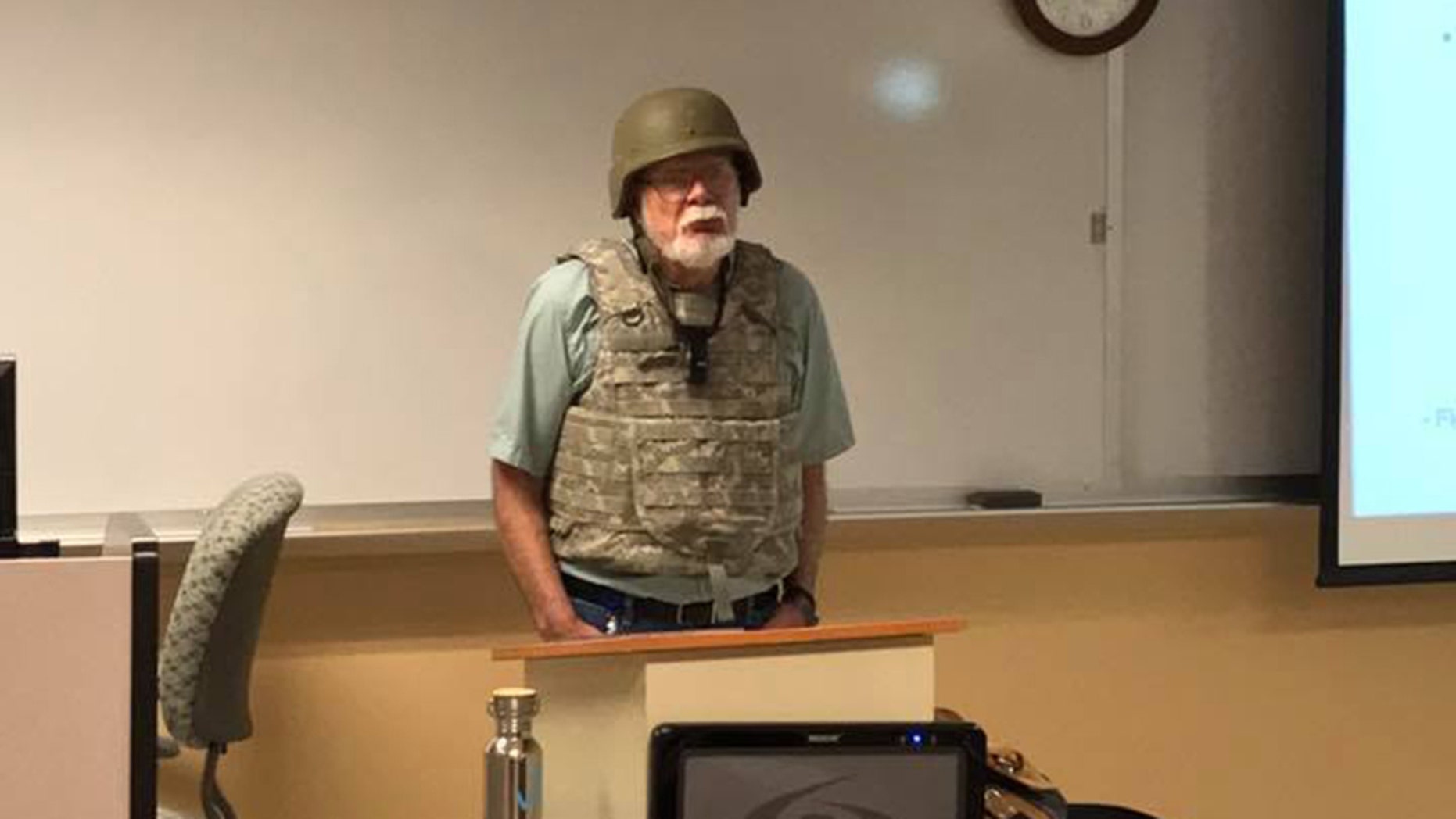 Professor Charles K. Smith of San Antonio College wore full combat gear to protest Texas' campus carry law.