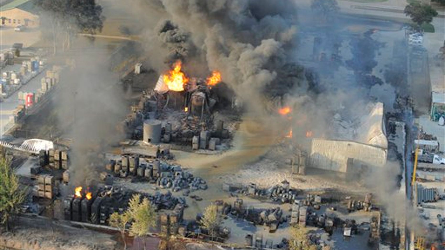 June 14: An aerial view of the fire raging at Multi-Chem Corp. near Acadiana Regional Airport in New Iberia, La.