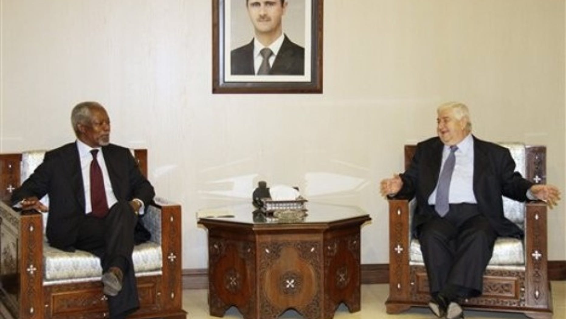 May 28, 2012: UN-Arab League Joint Special Envoy for Syria (JSE) Kofi Annan, left, meets with Syrian Foreign Minister Walid Moallem, right, in Damascus, Syria.