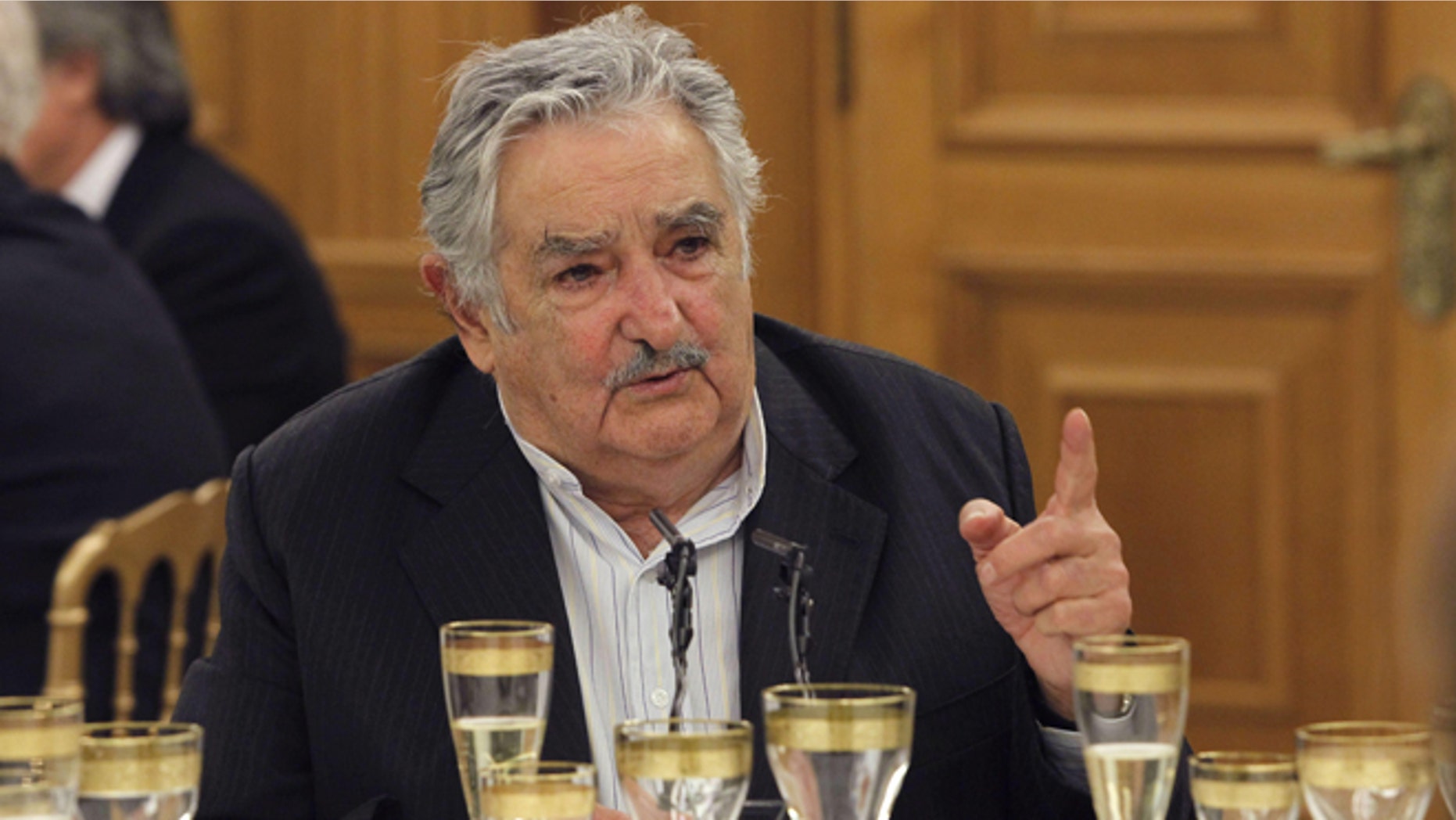 MADRID, SPAIN - MAY 29: President of Uruguay Jose Mujica attends a dinner hosted by King Juan Carlos I of Spain (not pictured) at Zarzuela Palace on May 29, 2013 in Madrid, Spain. Uruguay's President Jose Mujica is visiting Spain as part of an official tour to China, Spain, Italy and Vatican. (Photo by Alberto Martin - Pool/Getty Images)