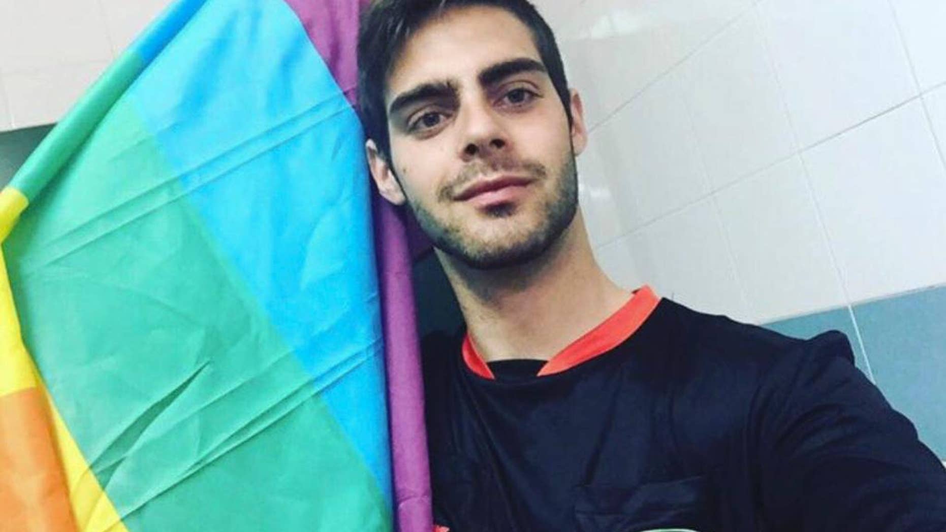 In this Friday, April 1, 2016 photo, Jesus Tomillero poses for a selfie at his home in La Linea, Cadiz, southern Spain. Tomillero, a gay Spanish soccer referee is giving up the job after repeatedly being the target of verbal abuse at games because of his sexual orientation. (AP Photo/Jesus Tomillero)