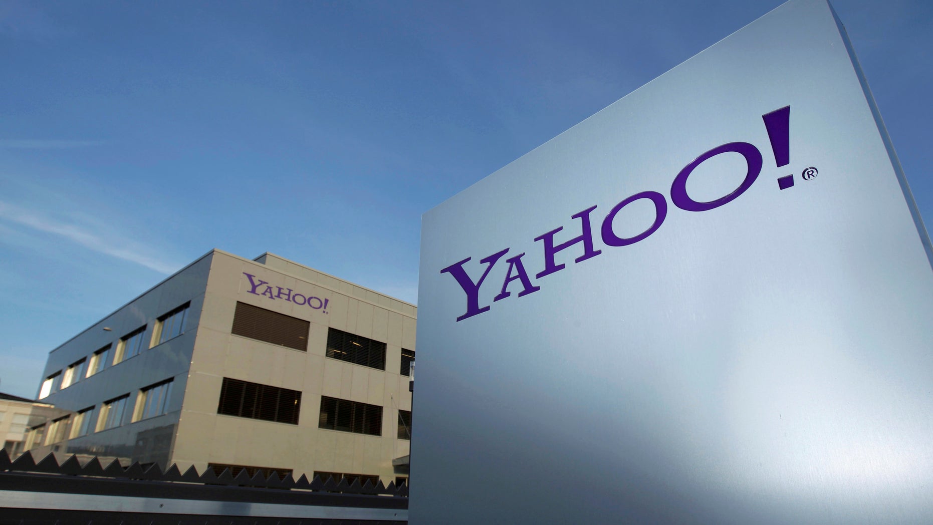 A Yahoo logo is pictured in front of a building in Rolle, 19 miles east of Geneva, December 12, 2012. ( REUTERS/Denis Balibouse/File photo)