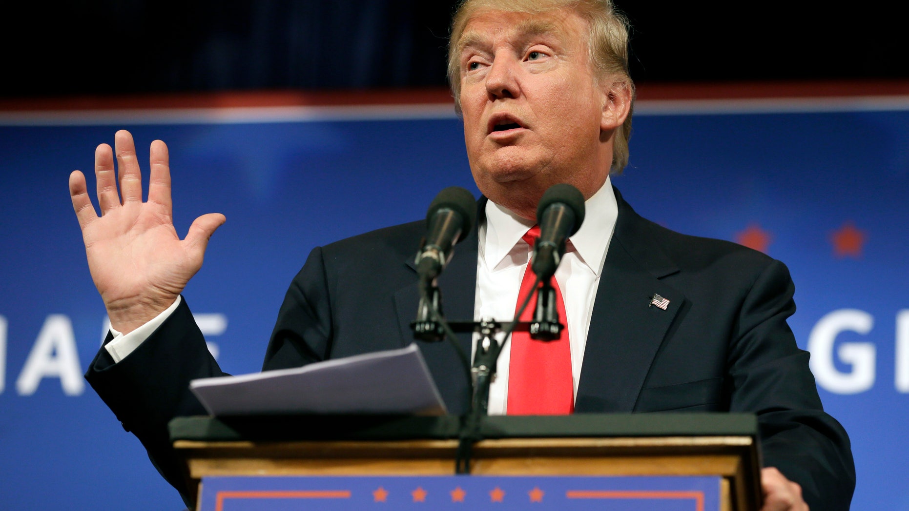 FILE - In this Tuesday, June 16, 2015, file photo, Republican presidential candidate Donald Trump speaks to supporters during a rally, in Des Moines, Iowa. A petition asking NBC to cut ties with Trump because of recent remarks he made on immigration, has collected more than 200,000 signatures. (AP Photo/Charlie Neibergall, File)