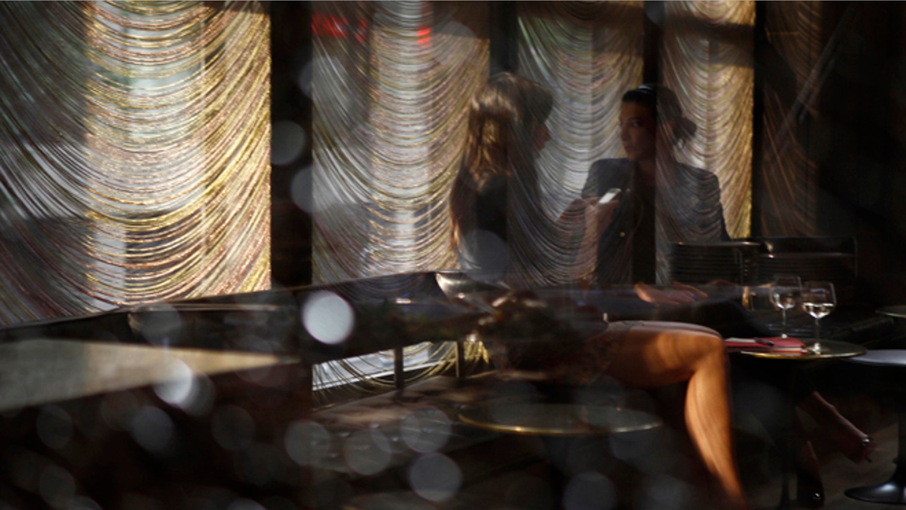 July 28, 2010: Women sit at a table in the bar of the Four Seasons Hotel in New York City.
