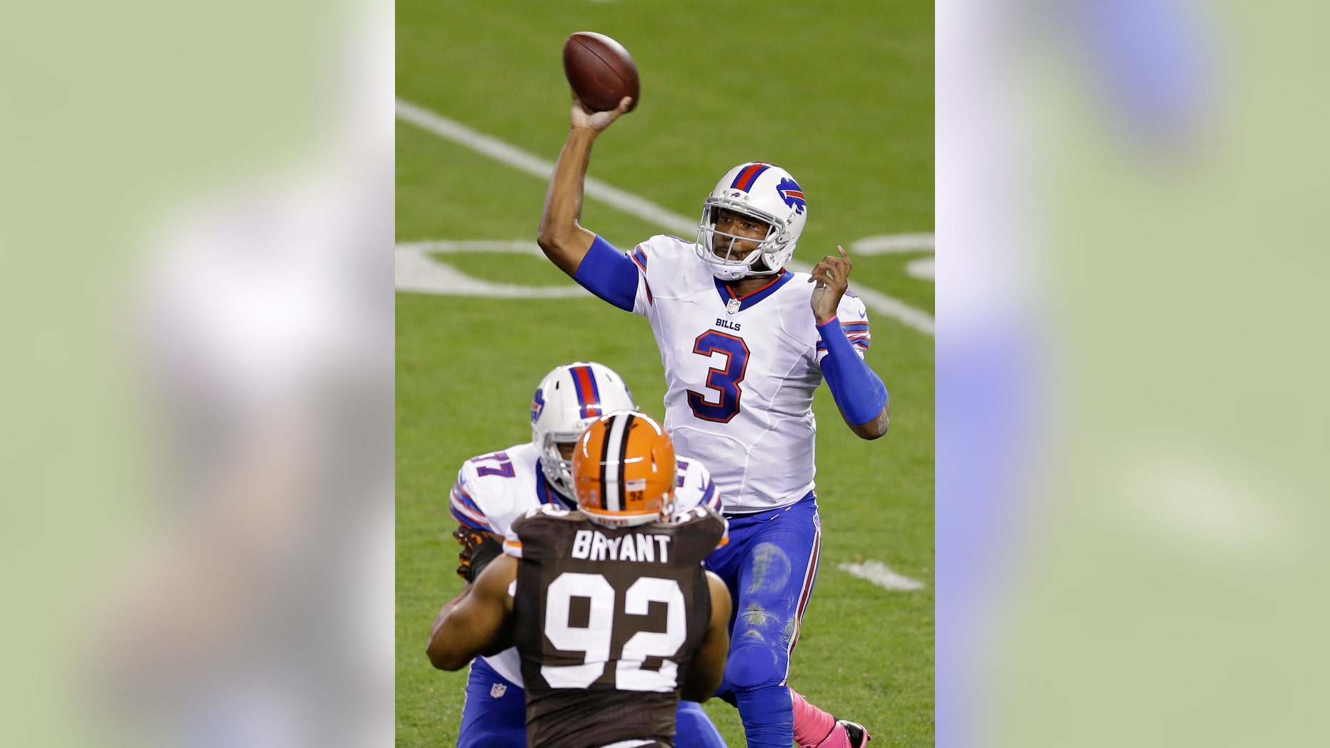 Buffalo Bills quarterback EJ Manuel (3) passes against the Cleveland Browns in the second quarter of an NFL football game Thursday, Oct. 3, 2013, in Cleveland. (AP Photo/Tony Dejak)