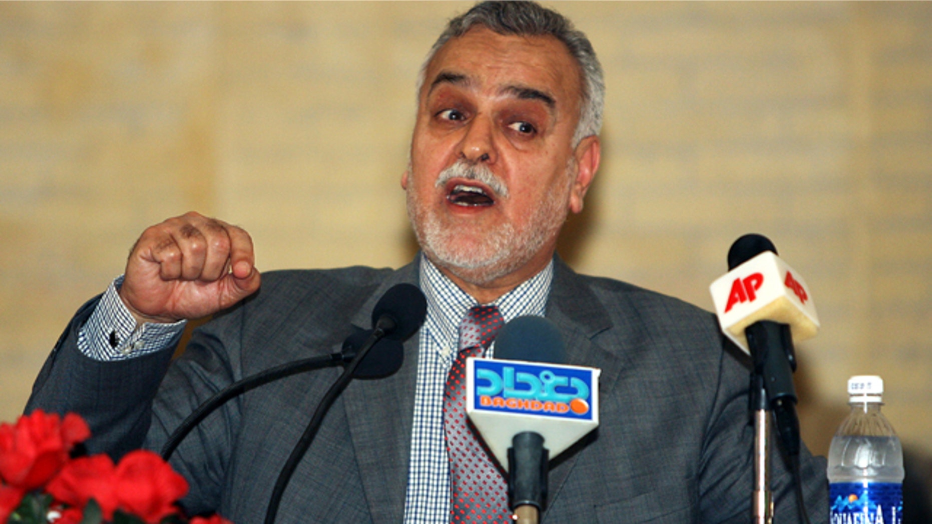 FILE 2006: Iraq's vice President Tariq al-Hashemi speaks to reporters during a news conference in Baghdad.