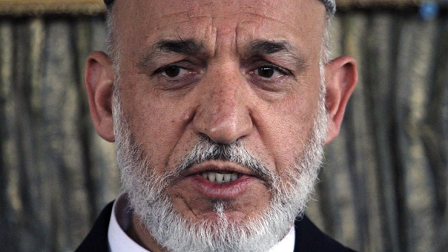 Oct. 9: Afghan President Hamid Karzai speaks in Kandahar province.