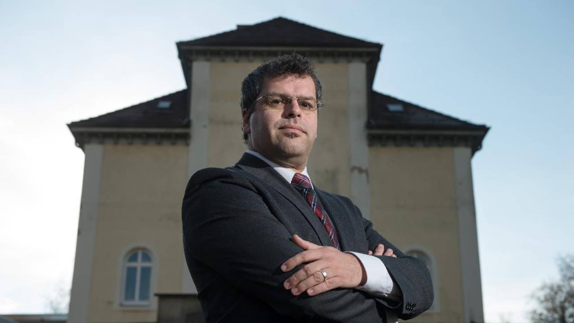 FILE - In this Nov. 24, 2015 file picture Jens Rommel, the head of a special prosecutors' office that looks into Nazi war crimes,poses in Ludwigsburg, Germany. German prosecutors say they have tracked down eight people who allegedly worked at the Nazis' Stutthof concentration camp during World War II and are considering whether they can be charged as accessories to murder. Jens Rommel, the head of a special prosecutors' office that looks into Nazi war crimes, told news agency dpa on Tuesday Aug. 9, 2016 that four male suspects worked as guards and four women were secretaries or telephone operators. (Marijan Murat/dpa via AP,file)