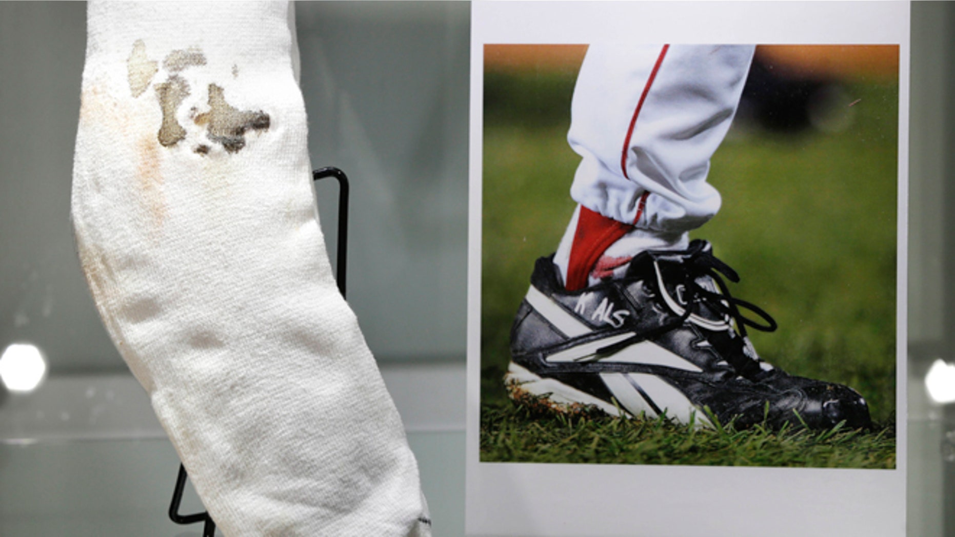 Feb. 21, 2013: The bloody sock worn by former Boston Red Sox pitcher Curt Schilling in Game 2 of the 2004 World Series is displayed at Heritage Auctions in New York.