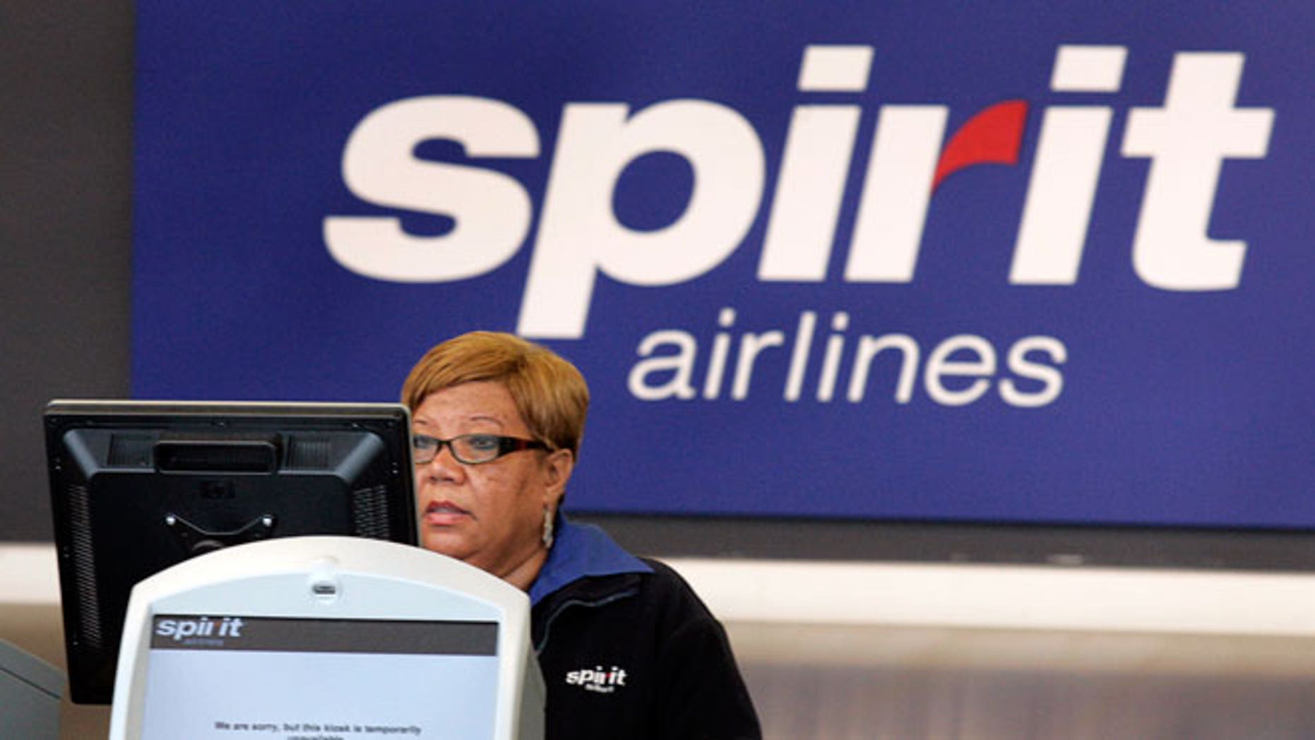 checked baggage fees for spirit airlines