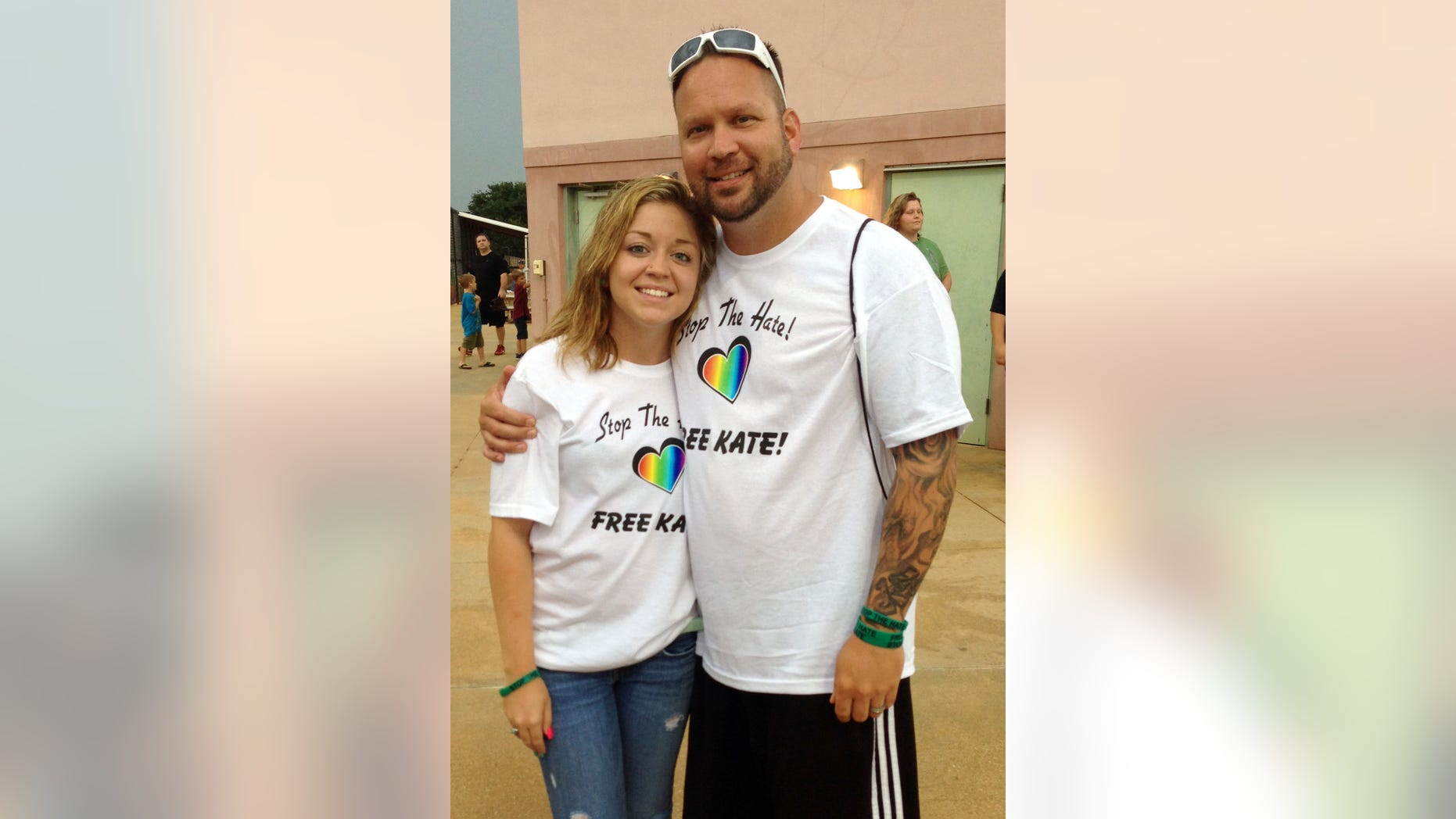 In this photo made available by the Hunt family, Kaitlyn Hunt and her father Steve in Vero Beach, Fla., Monday May 20, 2013. Kaitlyn, 18, was expelled from school for dating and having sex with her 14-year-old girlfriend, who was a fellow player on her basketball team. Hunt was arrested and charged with two felony counts of lewd and lascivious battery on a child 12 to 16 years. (AP Photo/Hunt Family, HO)