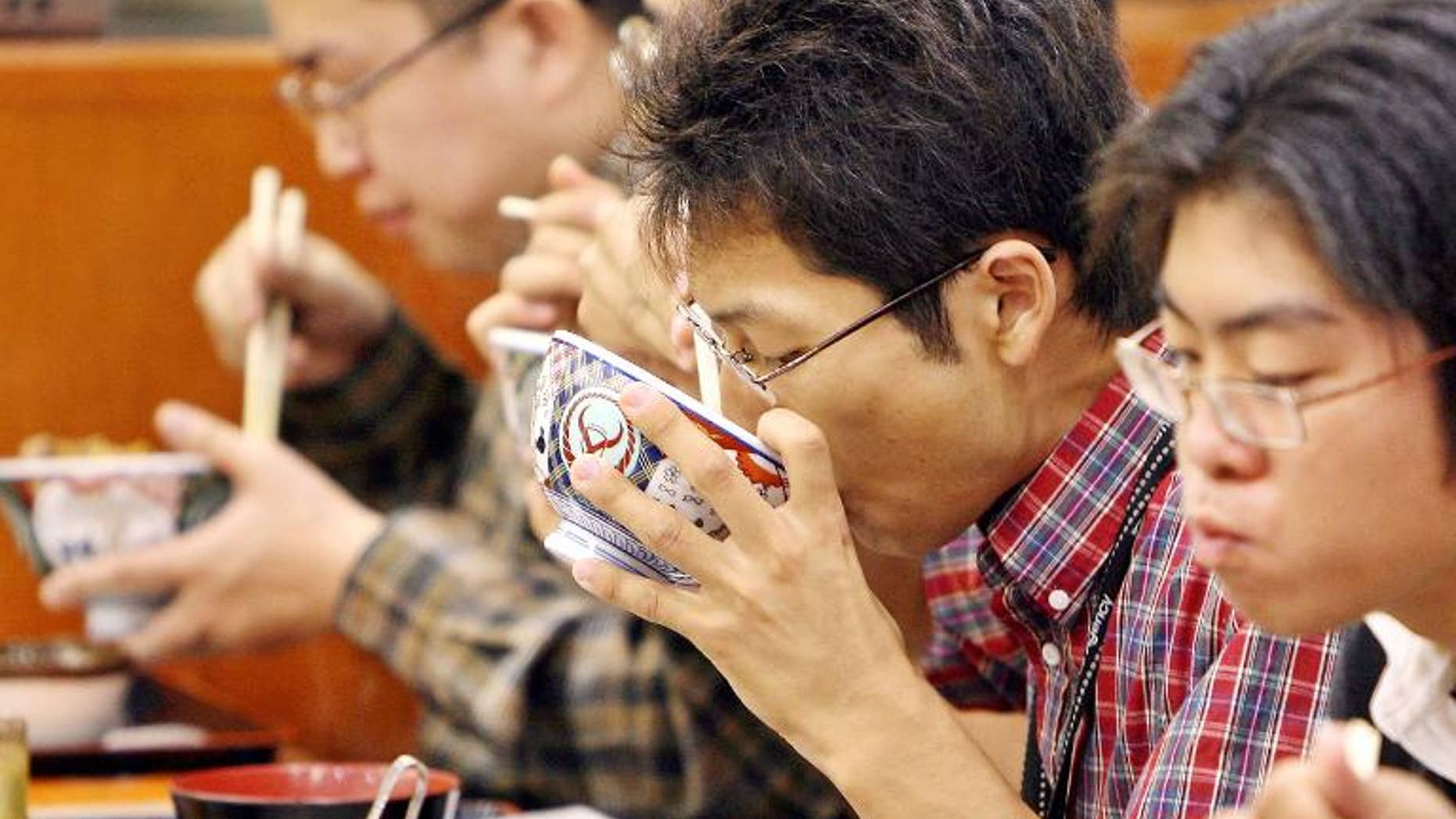 Illustration: customers dine at a Yoshinoya fast food restaurant in Tokyo. The company says it will start farming produce in Fukushima