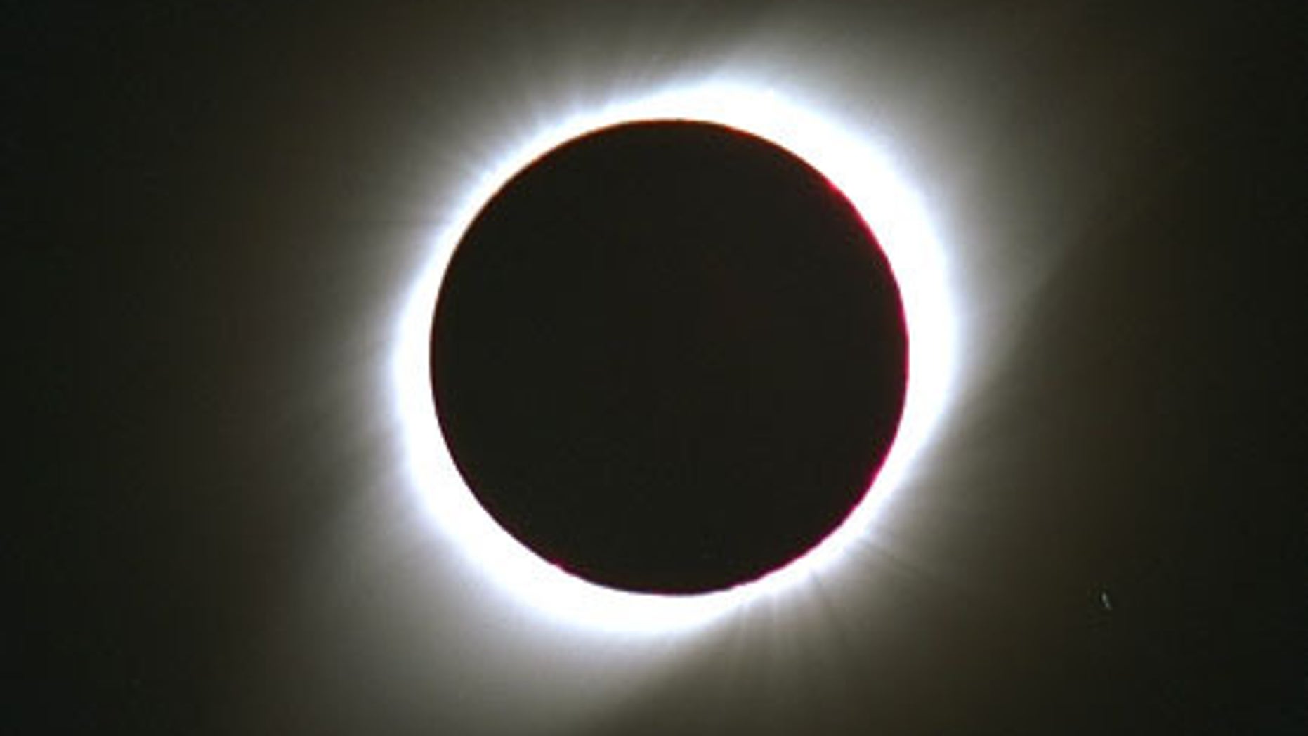 This photograph shows the total solar eclipse of Oct. 24, 1995, as seen from Dundlod, India.